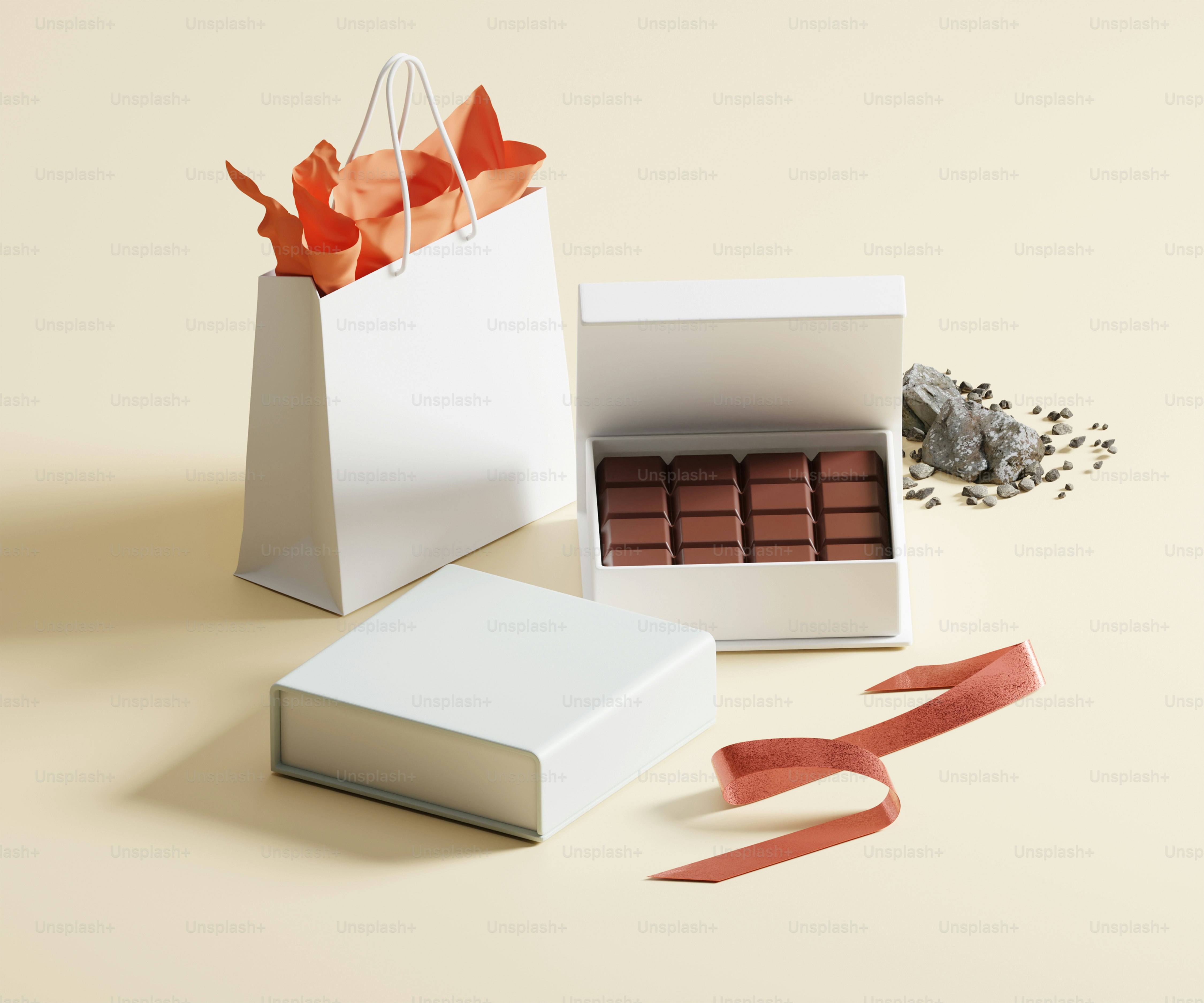 A box of chocolates and a ribbon on a table