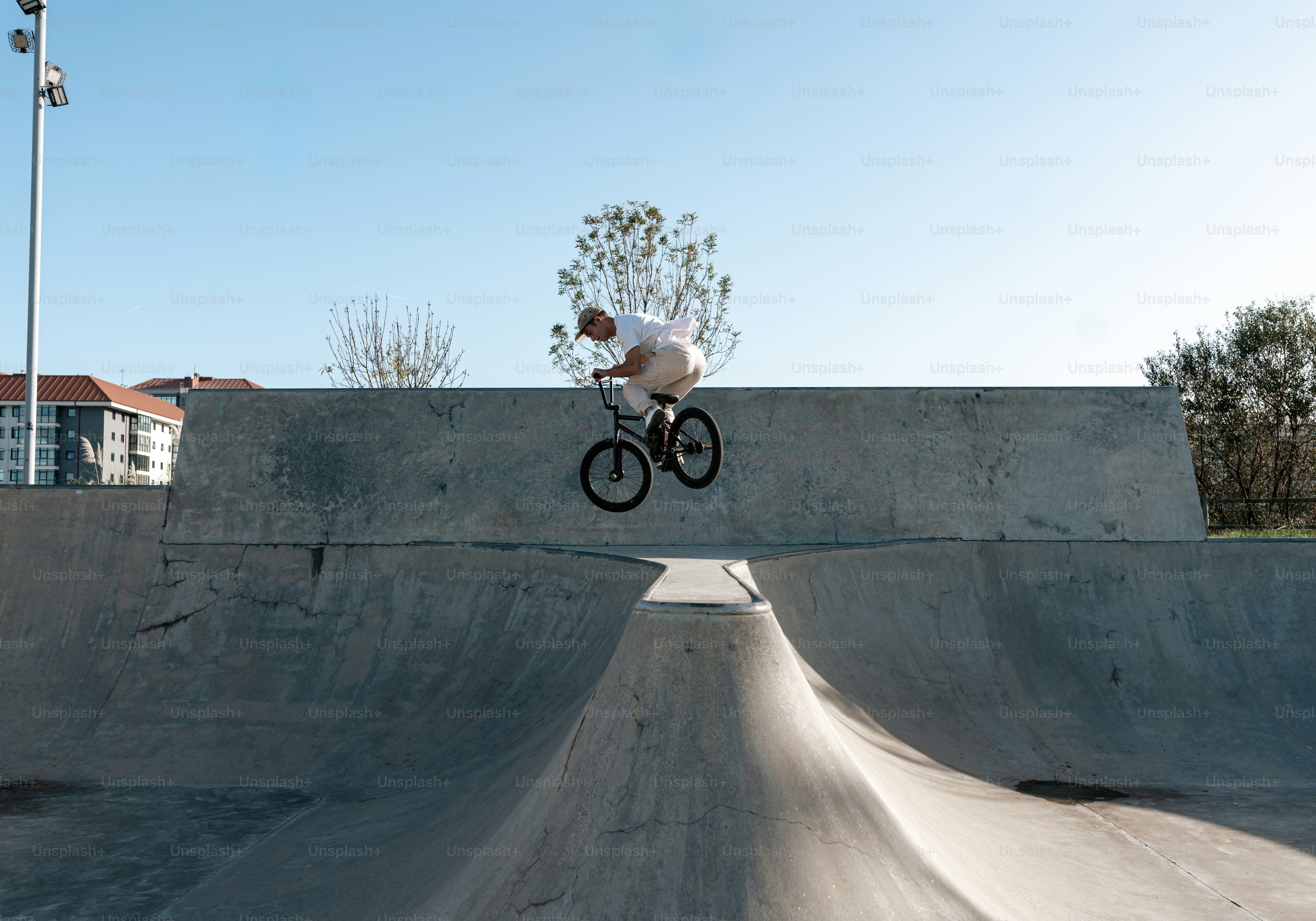A man riding a bike in a skate park photo – Bike Image on Unsplash