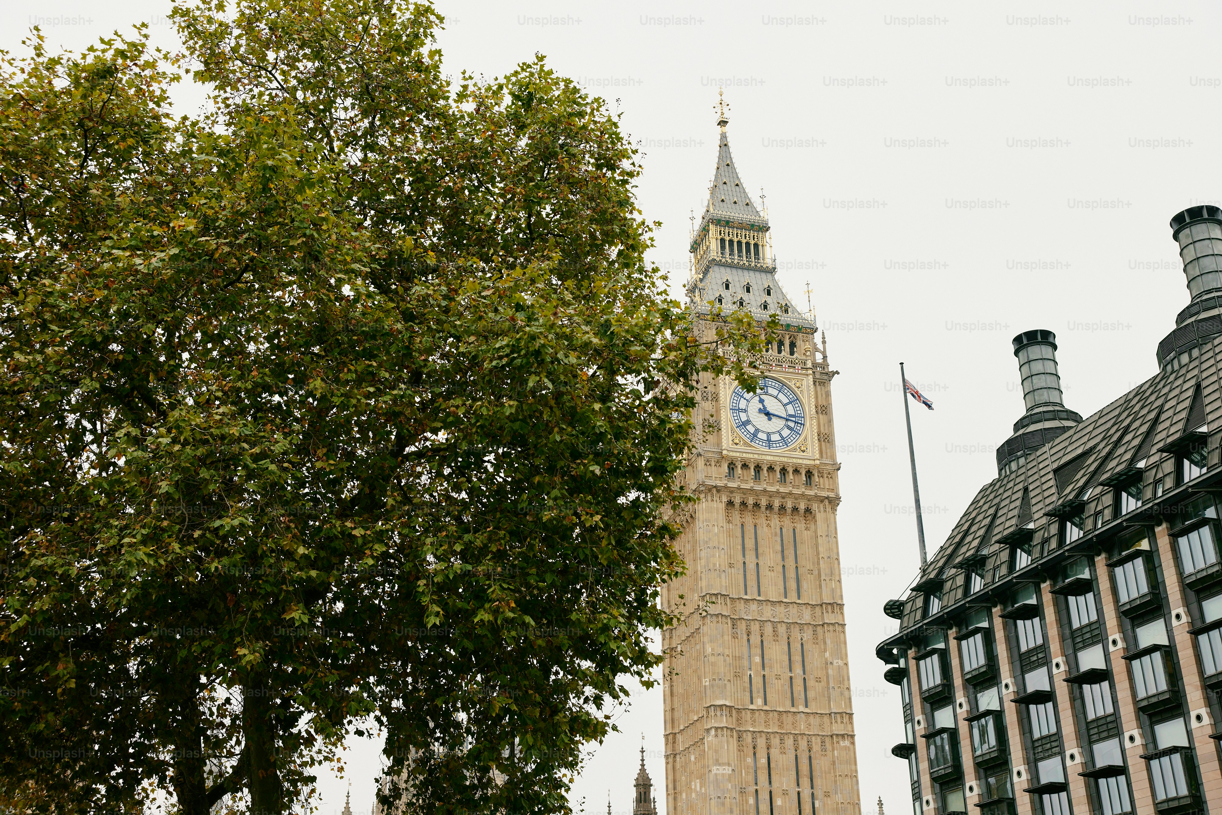A tall clock tower towering over a city