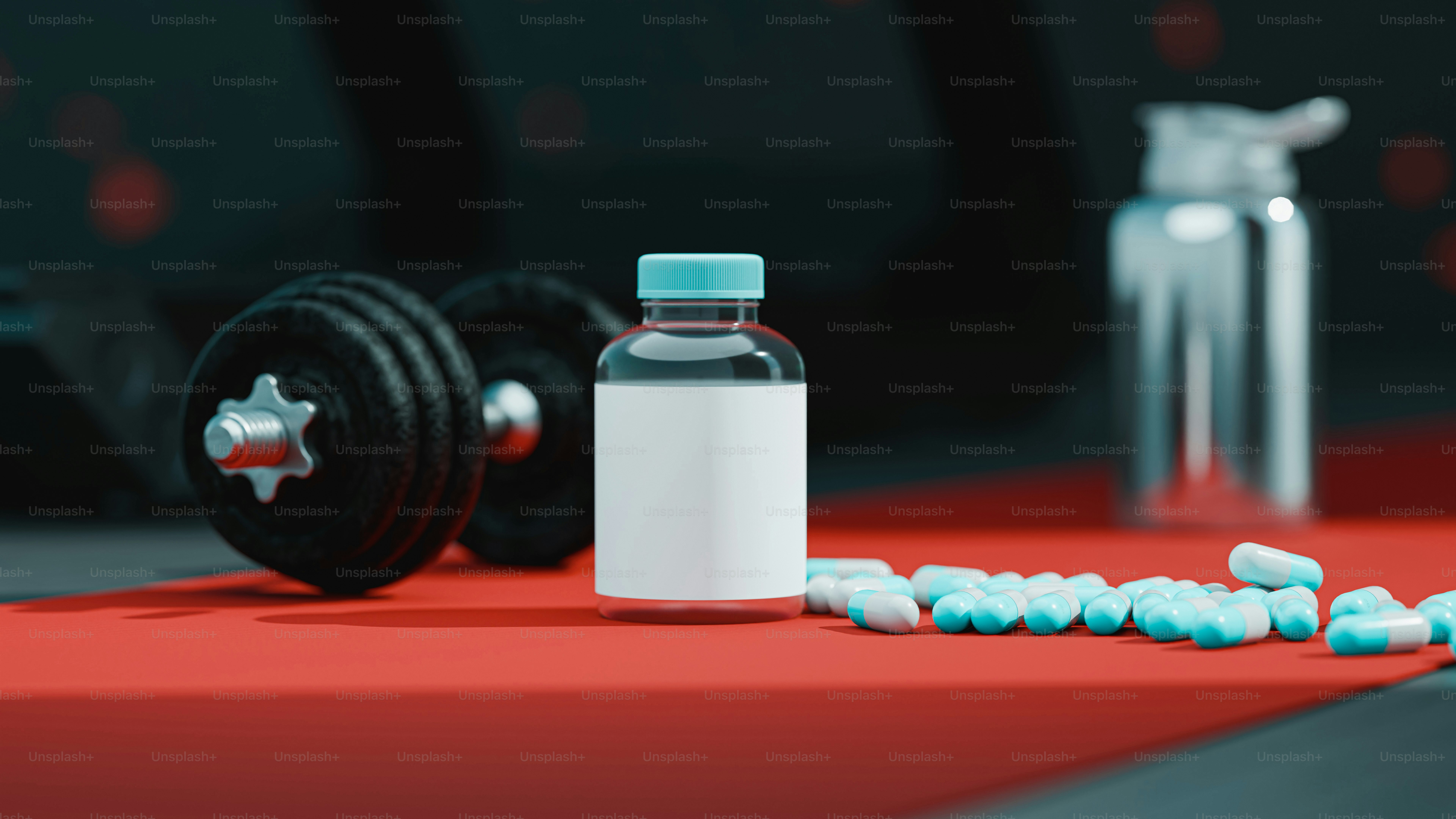 A bottle of pills sitting on top of a red carpet