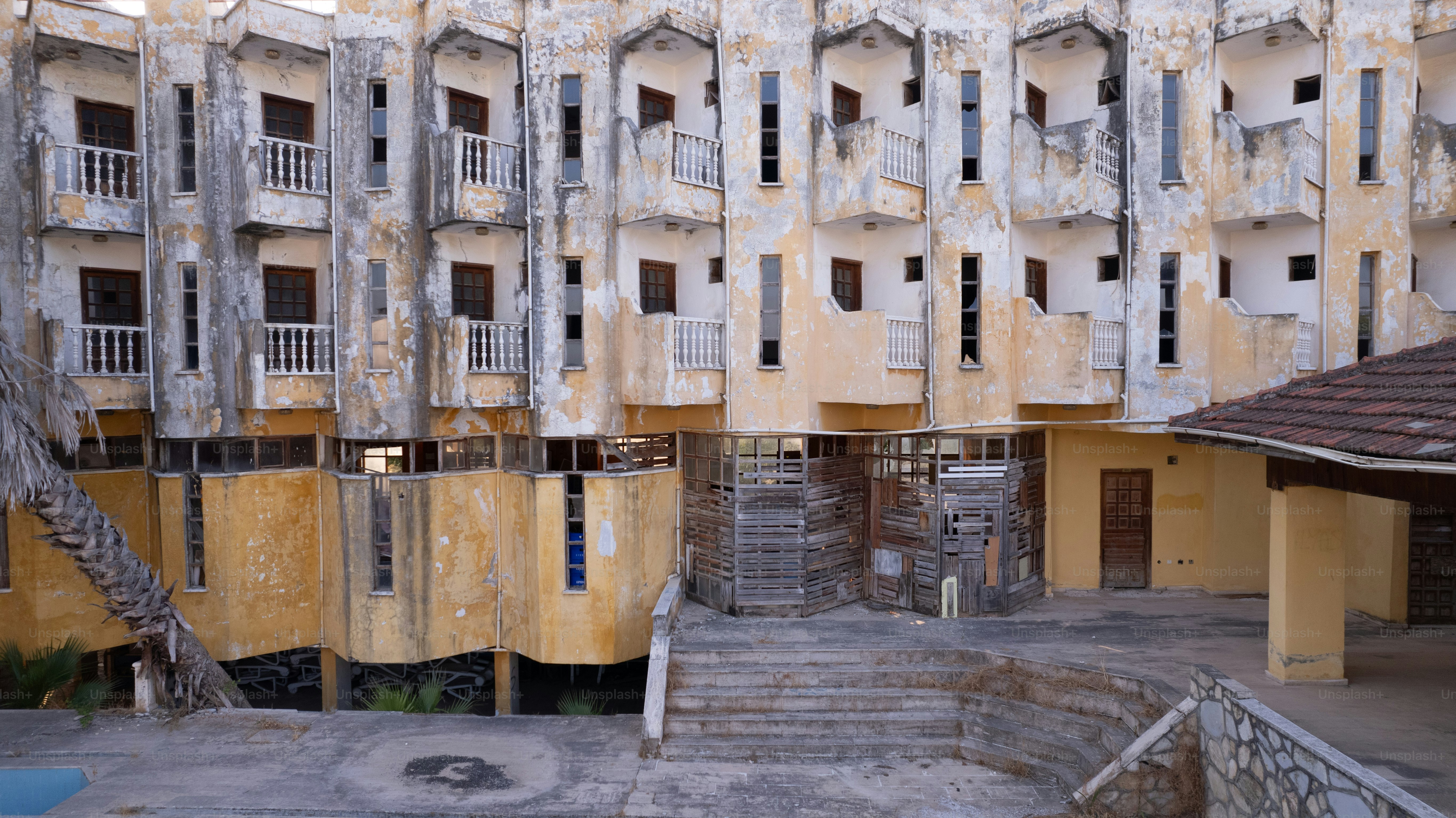 An old building with a lot of windows and balconies