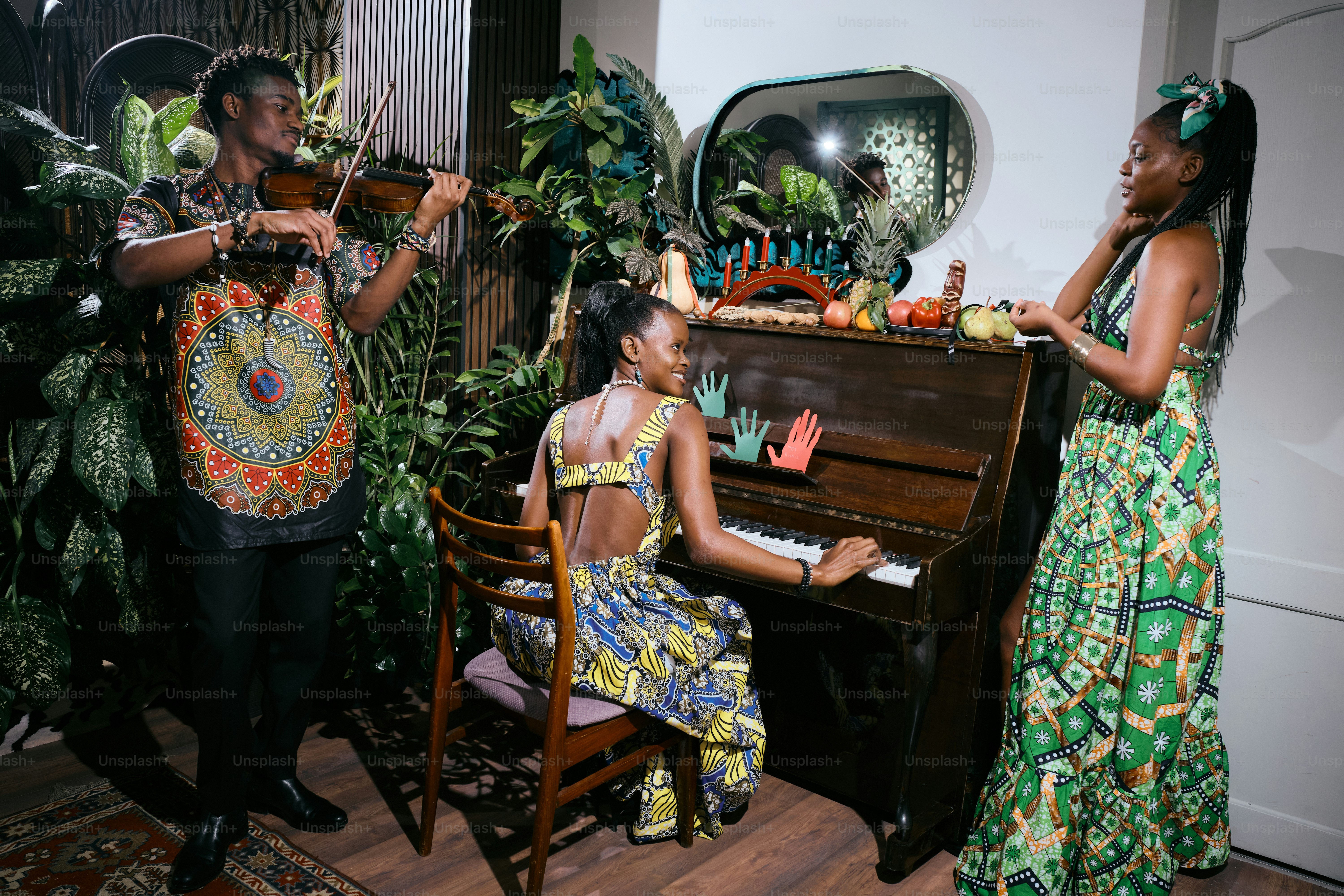 A group of people standing around a piano