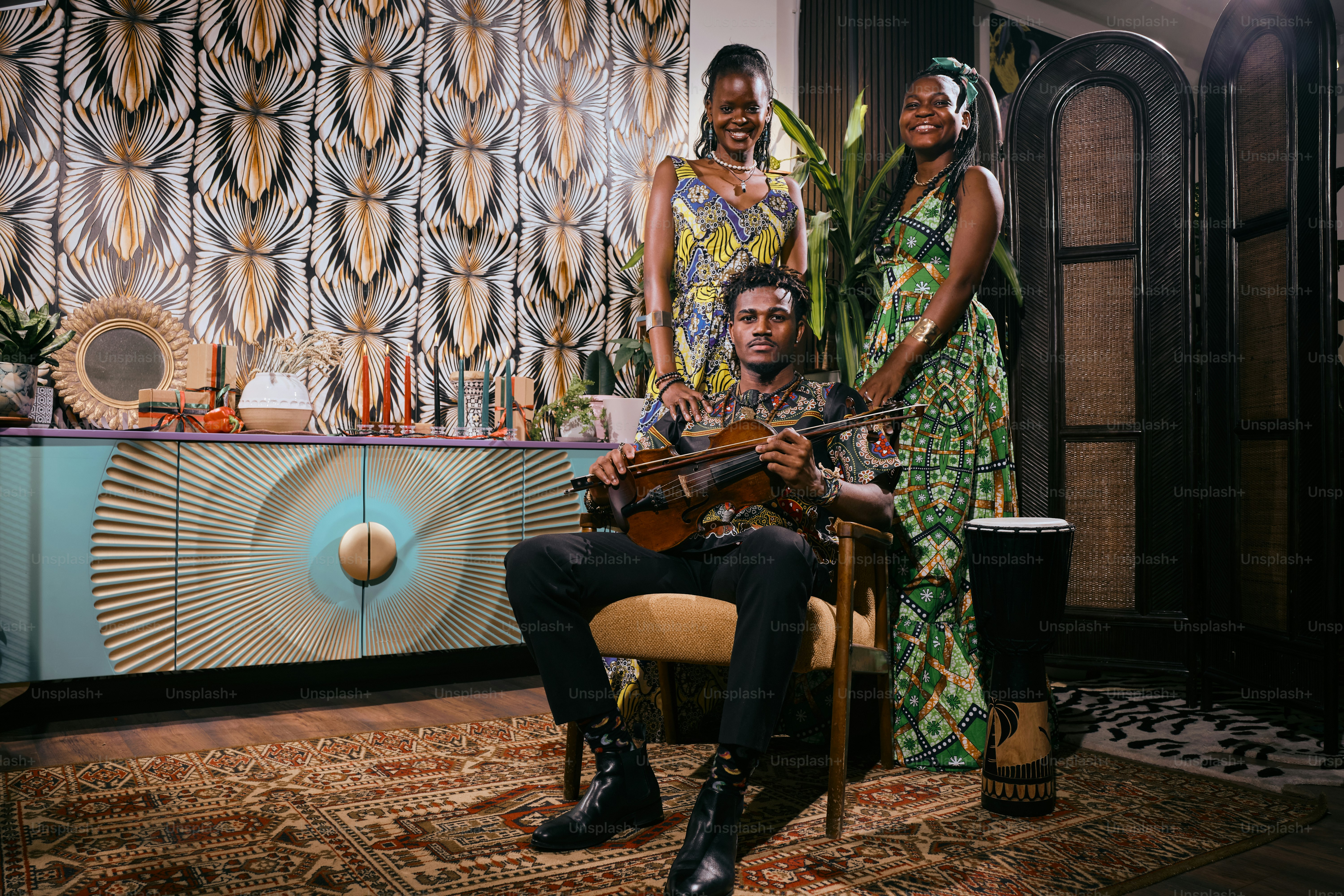 A group of people that are standing in a room