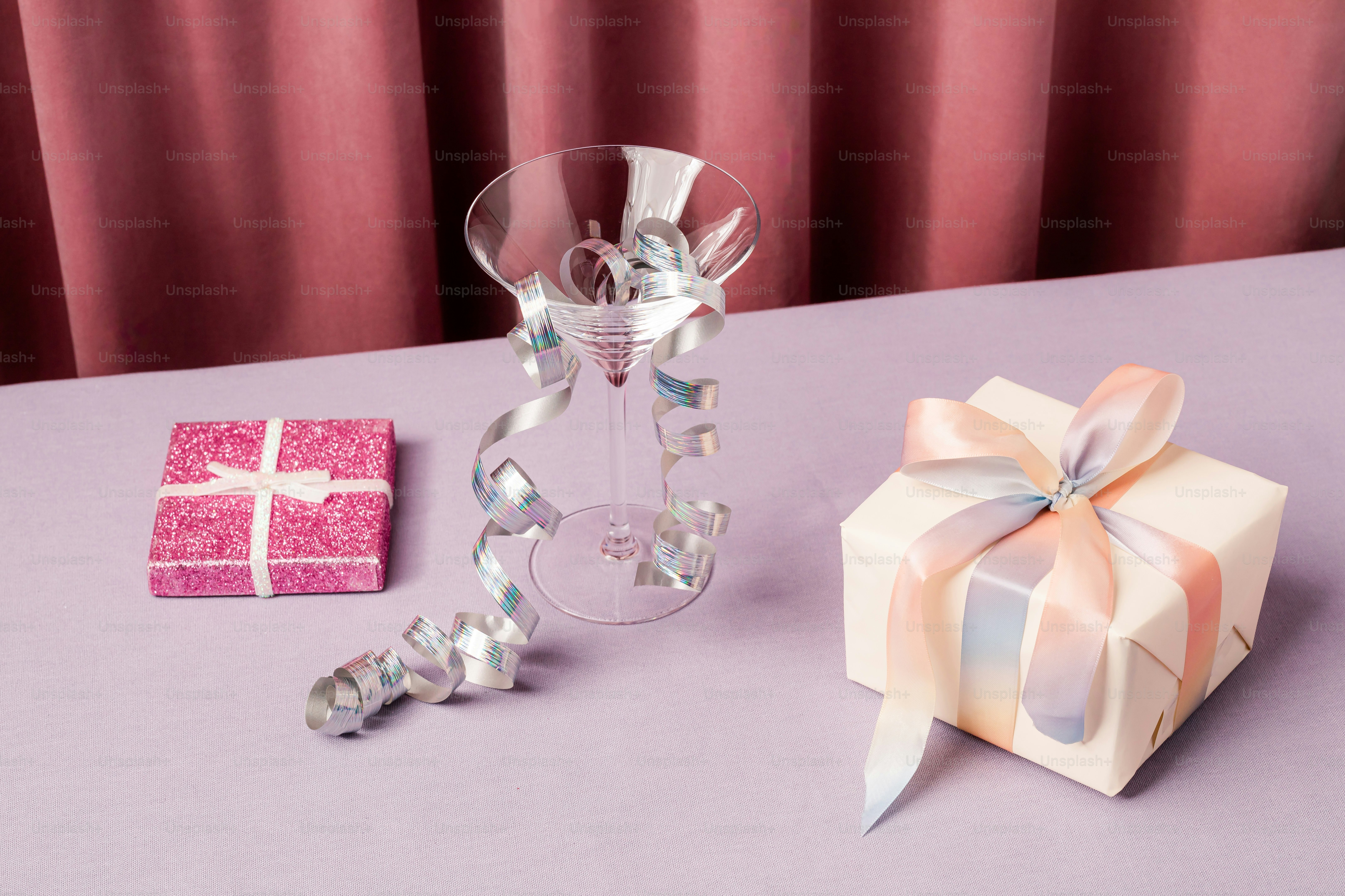 A table with a gift and a knife on it