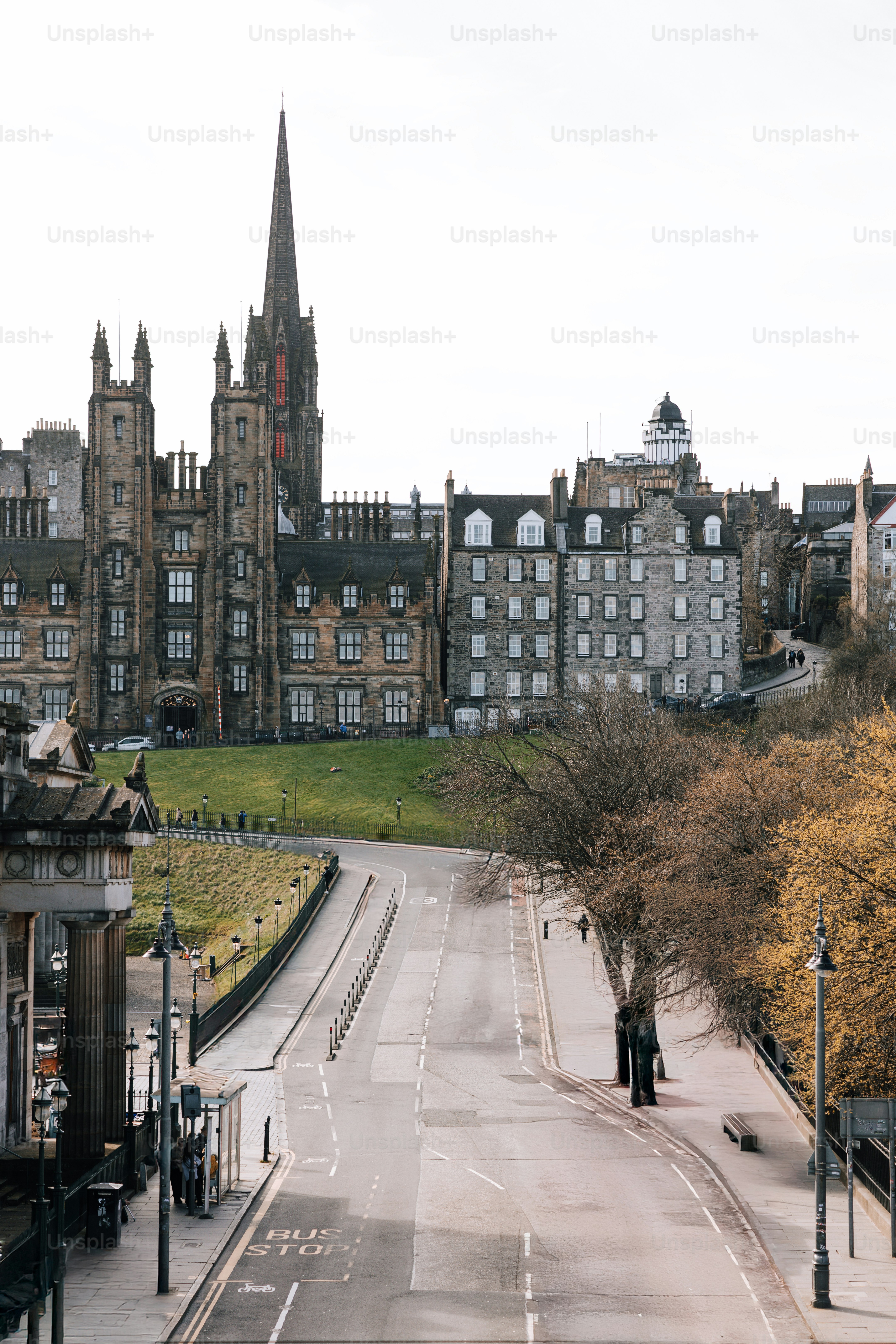 A view of a city street with buildings in the background