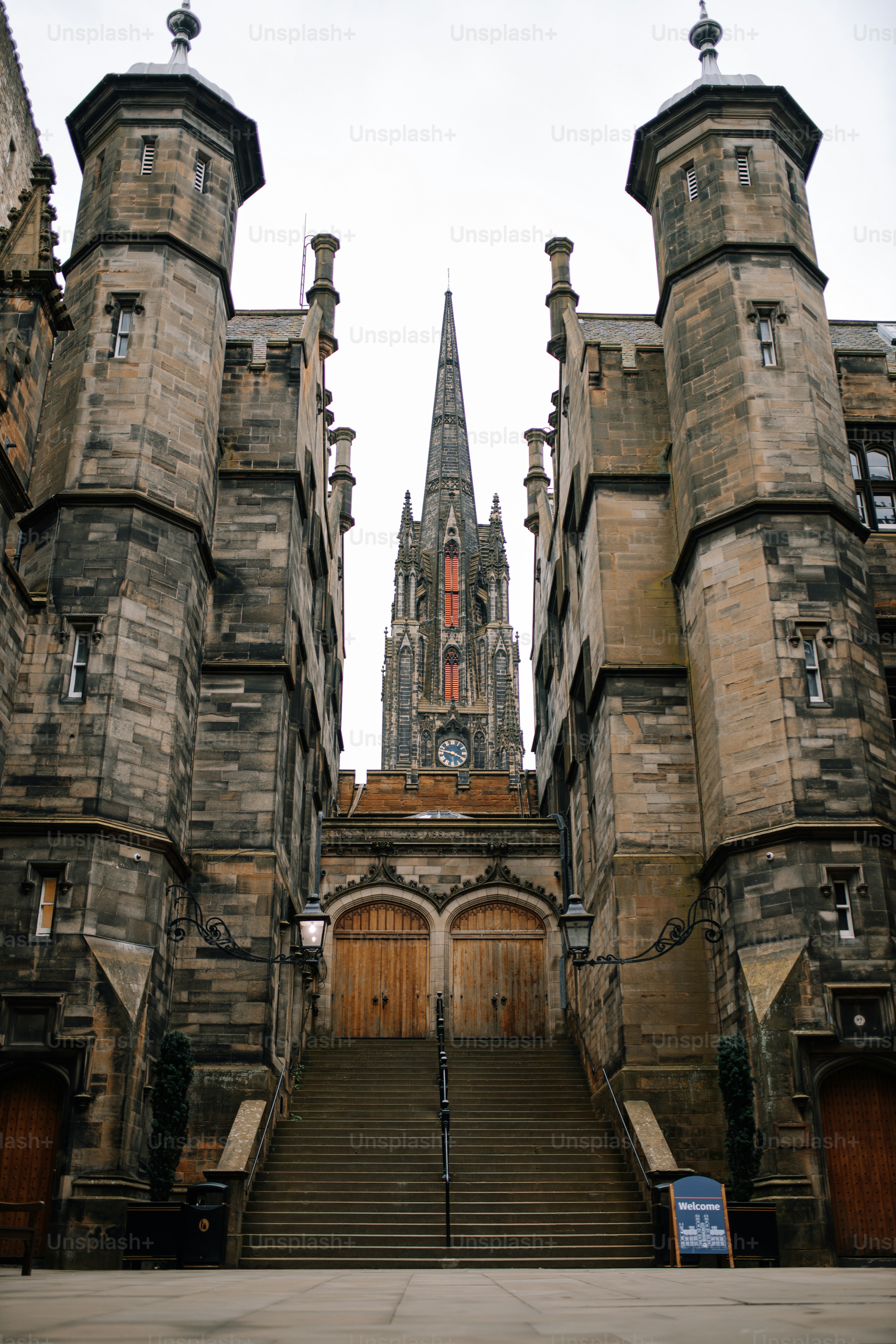 A very tall building with a clock on it's side