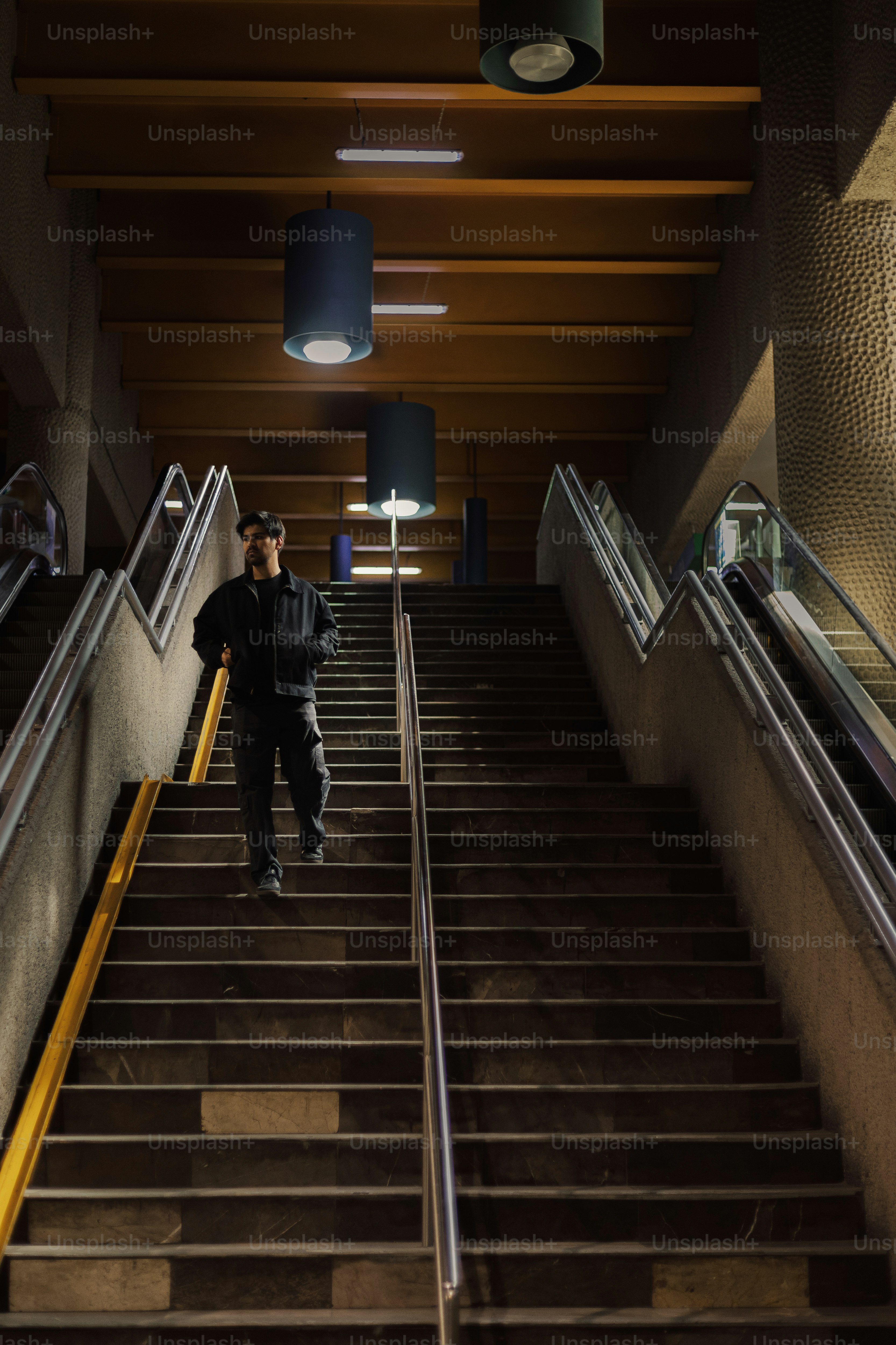 A man walking down a flight of stairs