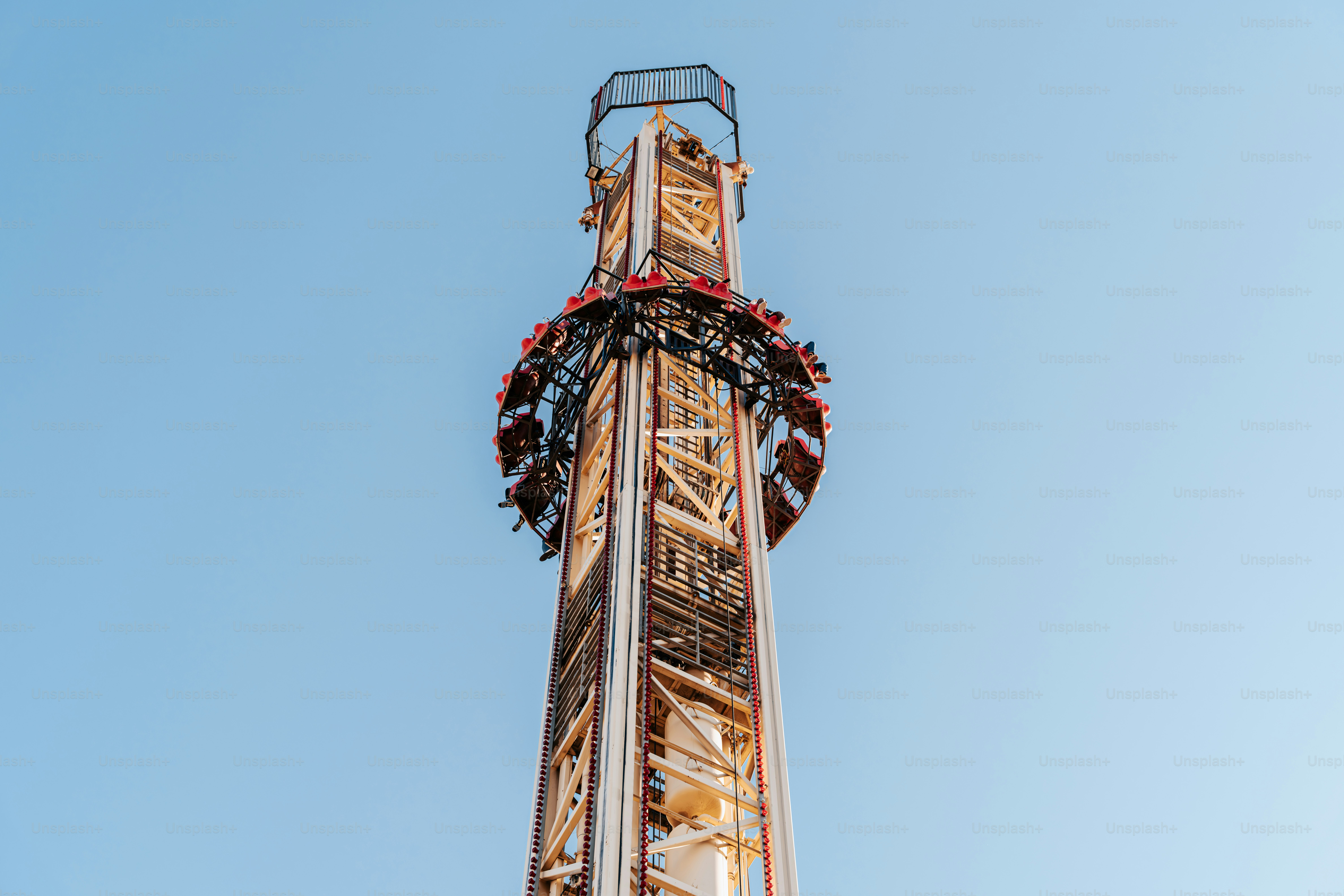 A roller coaster ride with a sky background