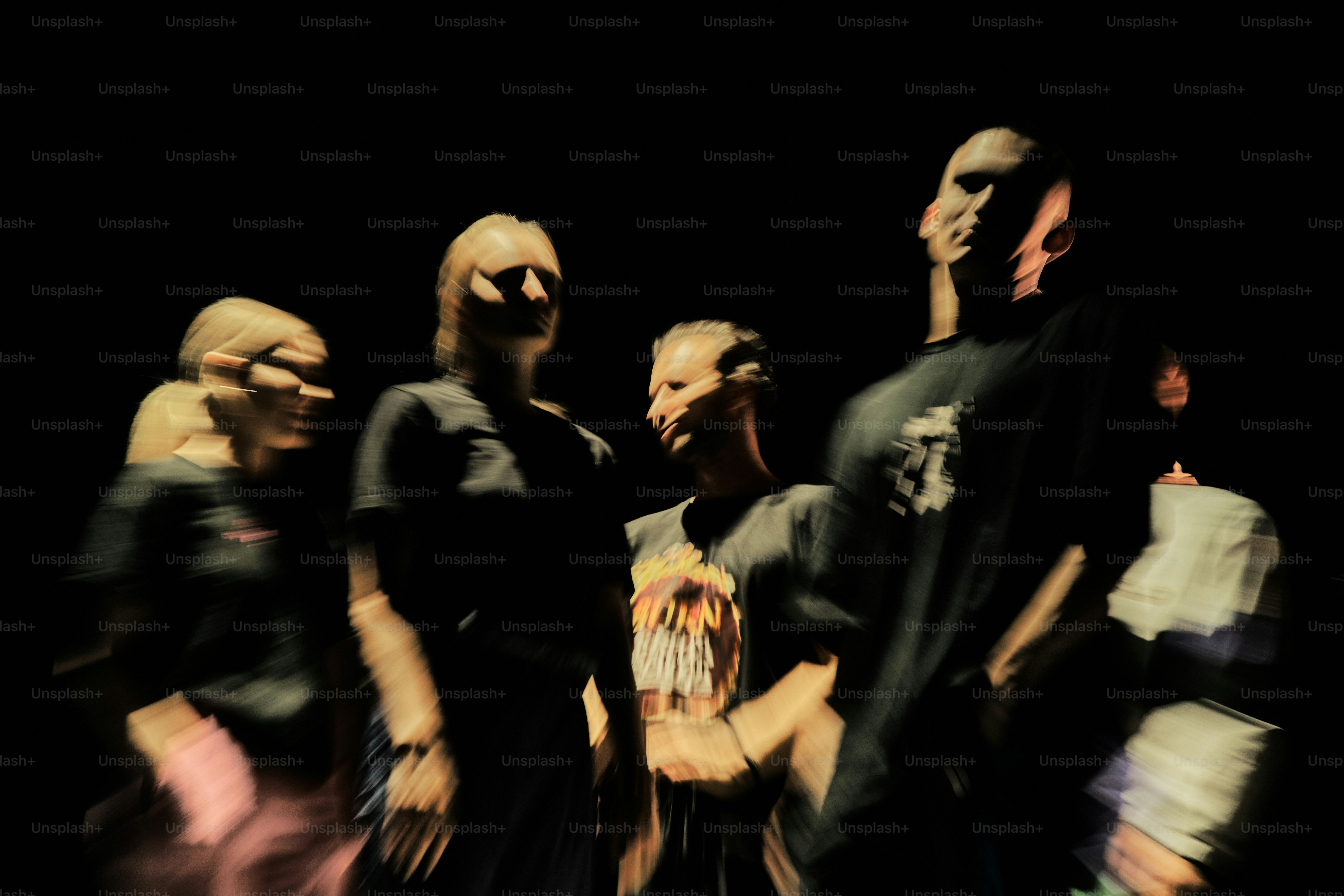 A group of people standing next to each other