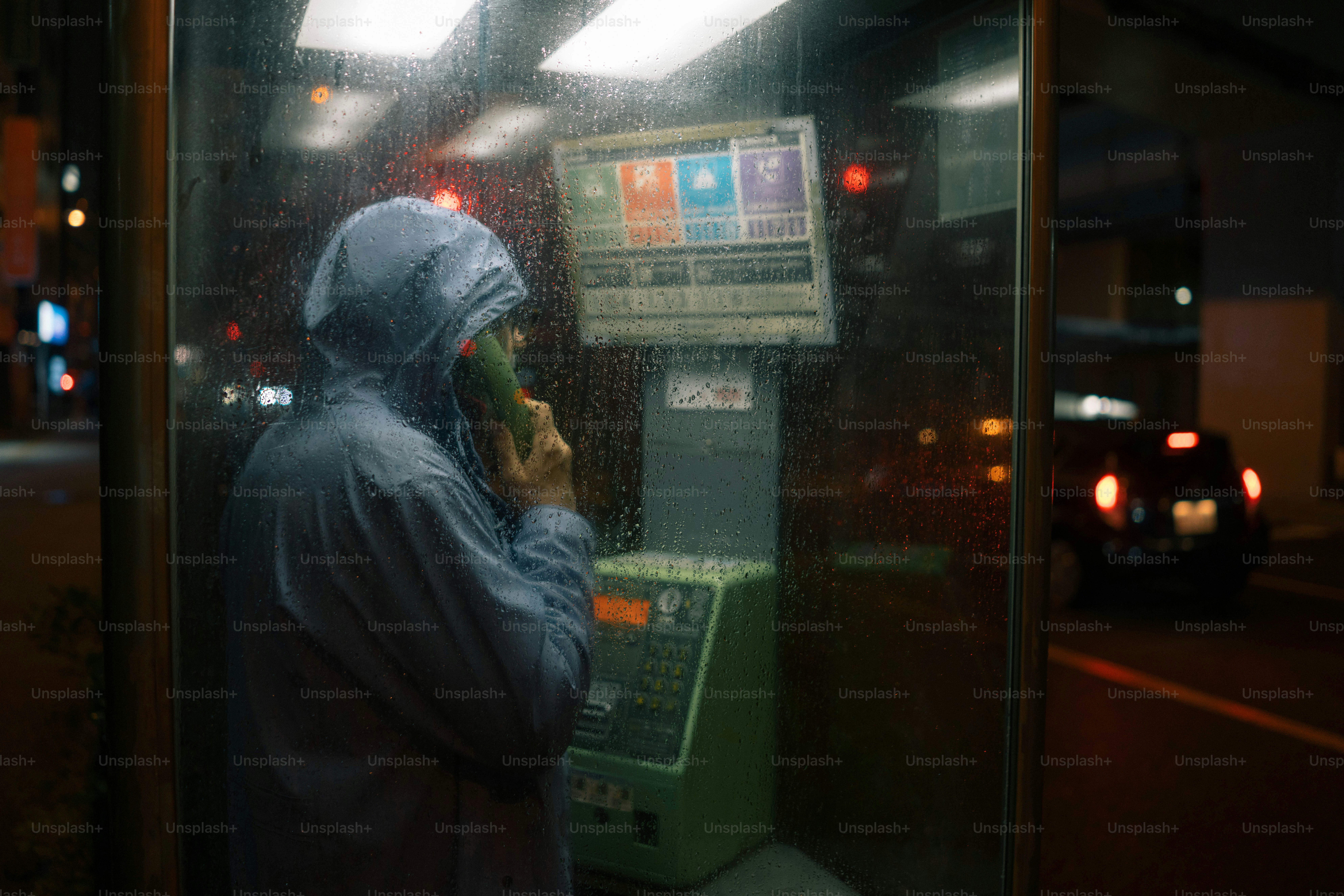 A person standing in front of a vending machine