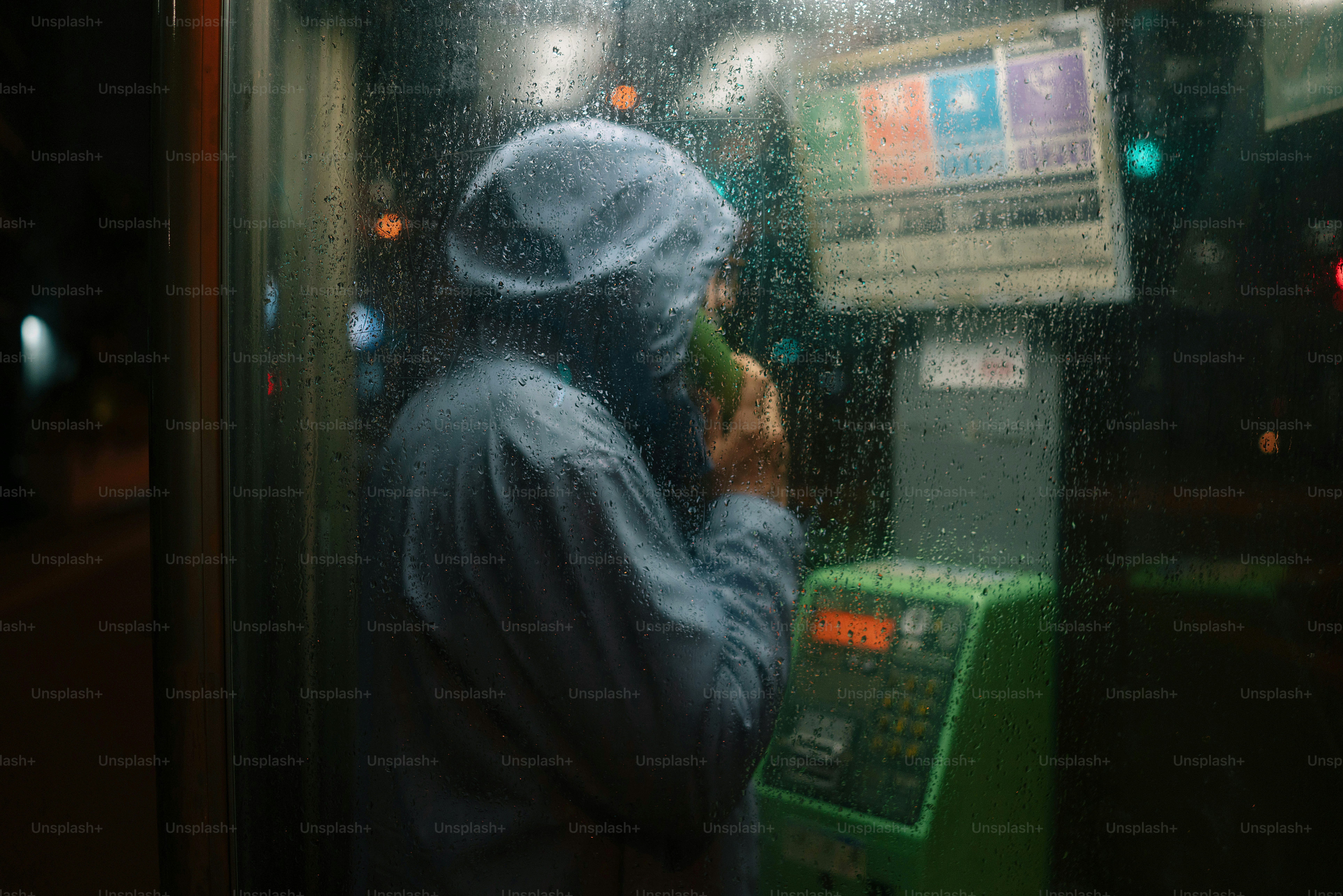 A person standing in front of a vending machine