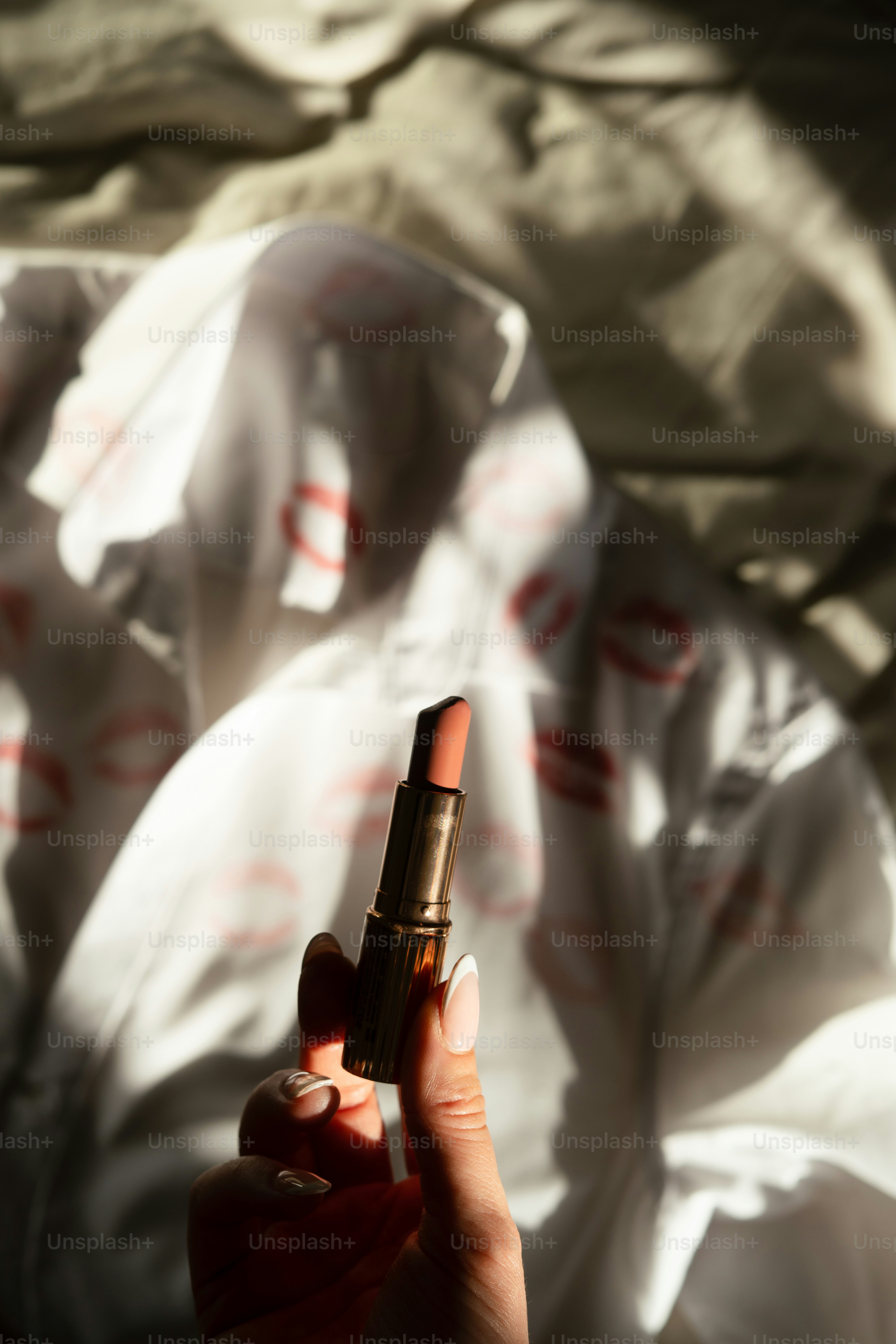 A person holding a gun in their hand