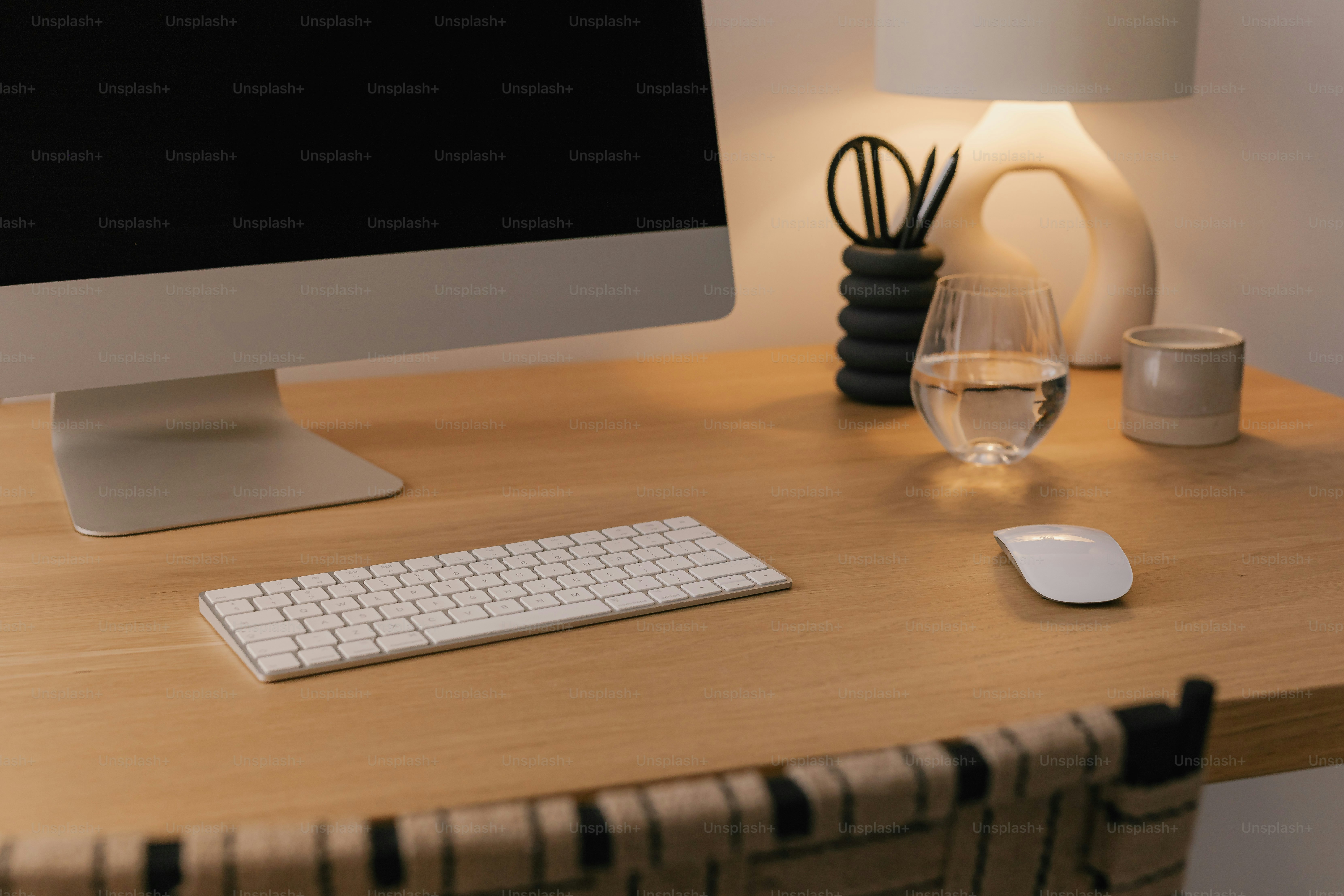A desktop computer sitting on top of a wooden desk