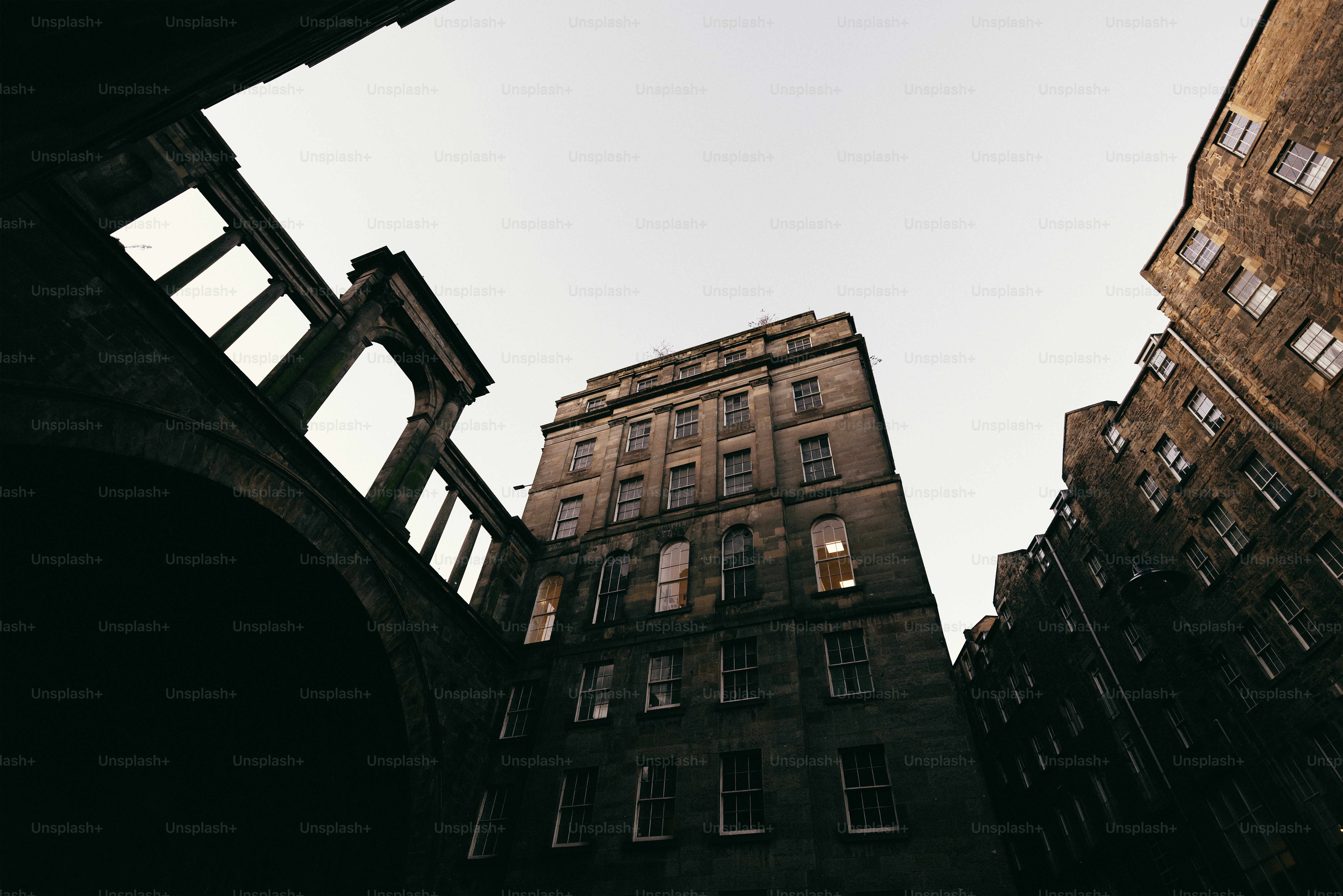 Looking up at tall buildings in a city