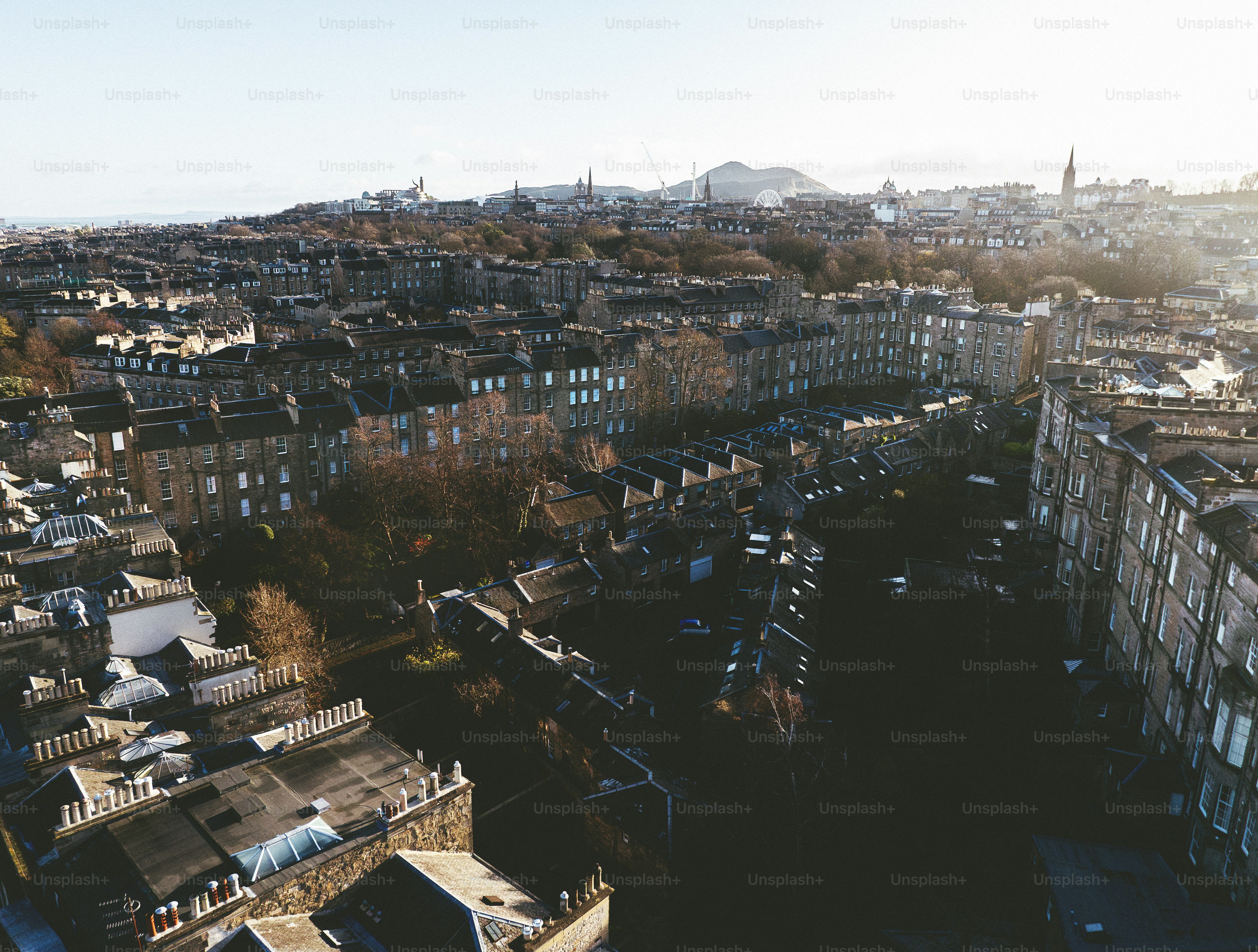 An aerial view of a city with tall buildings