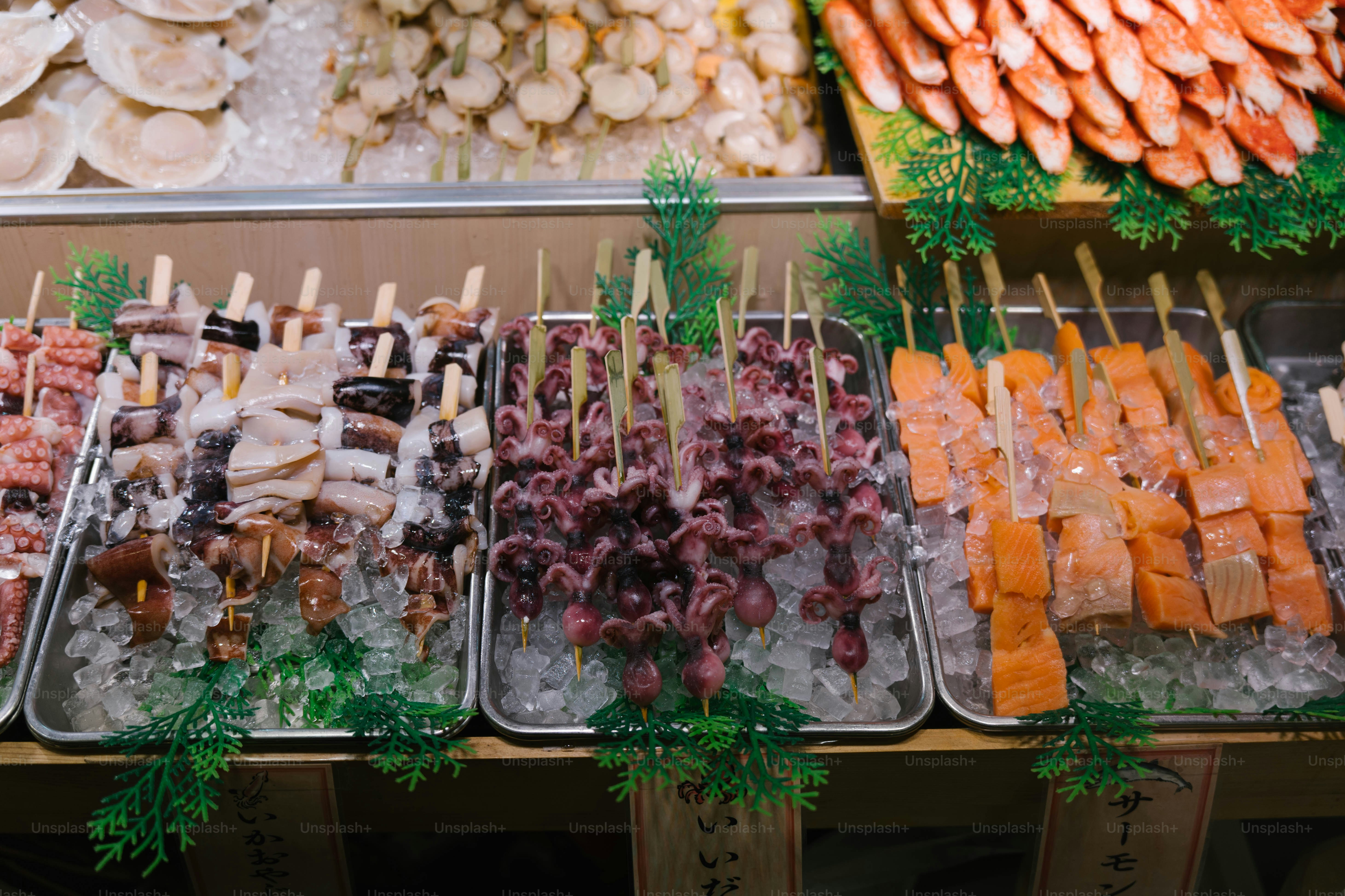 A variety of food is displayed on a buffet table