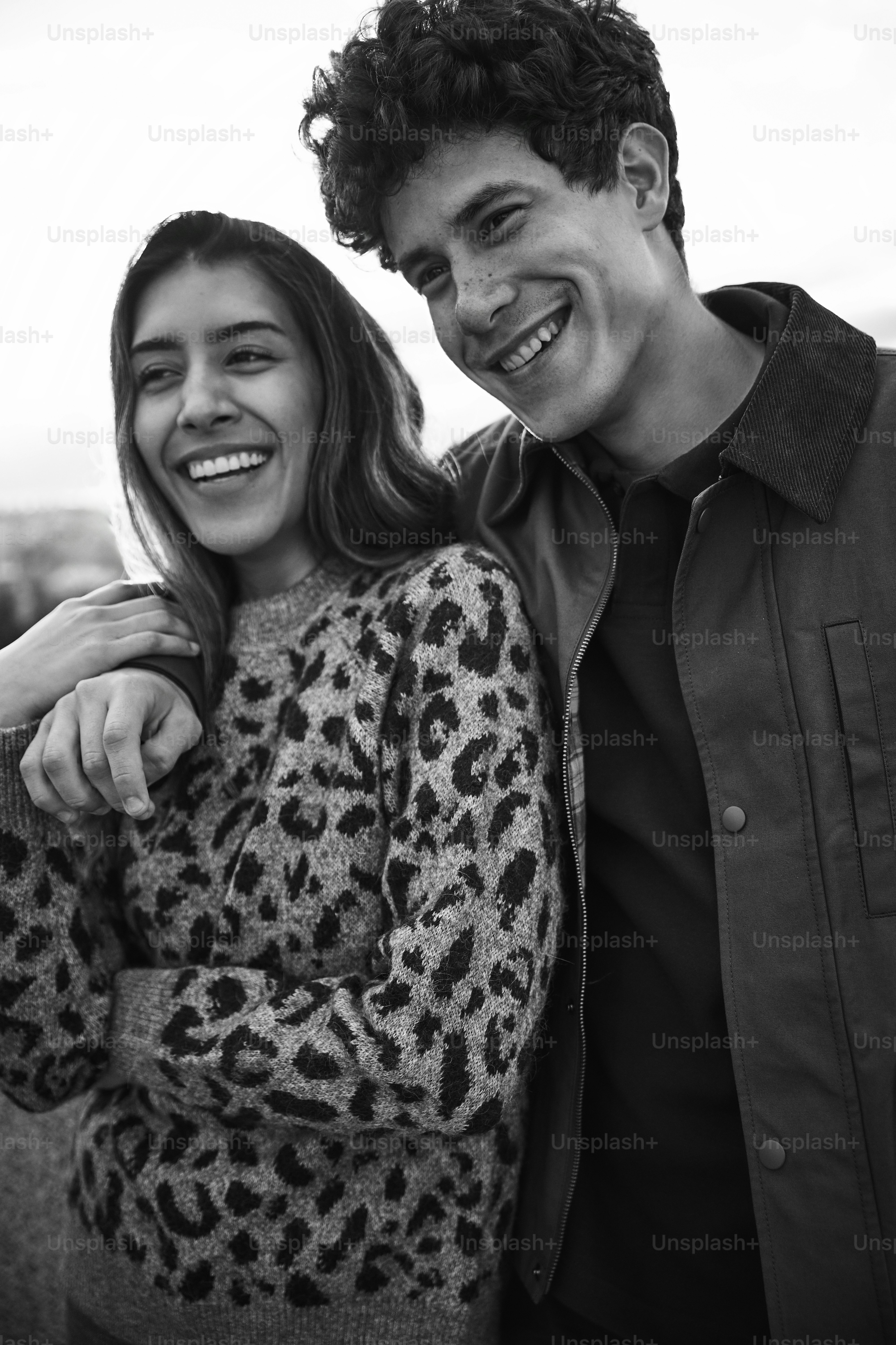 A man and a woman standing next to each other photo – Love Image on ...