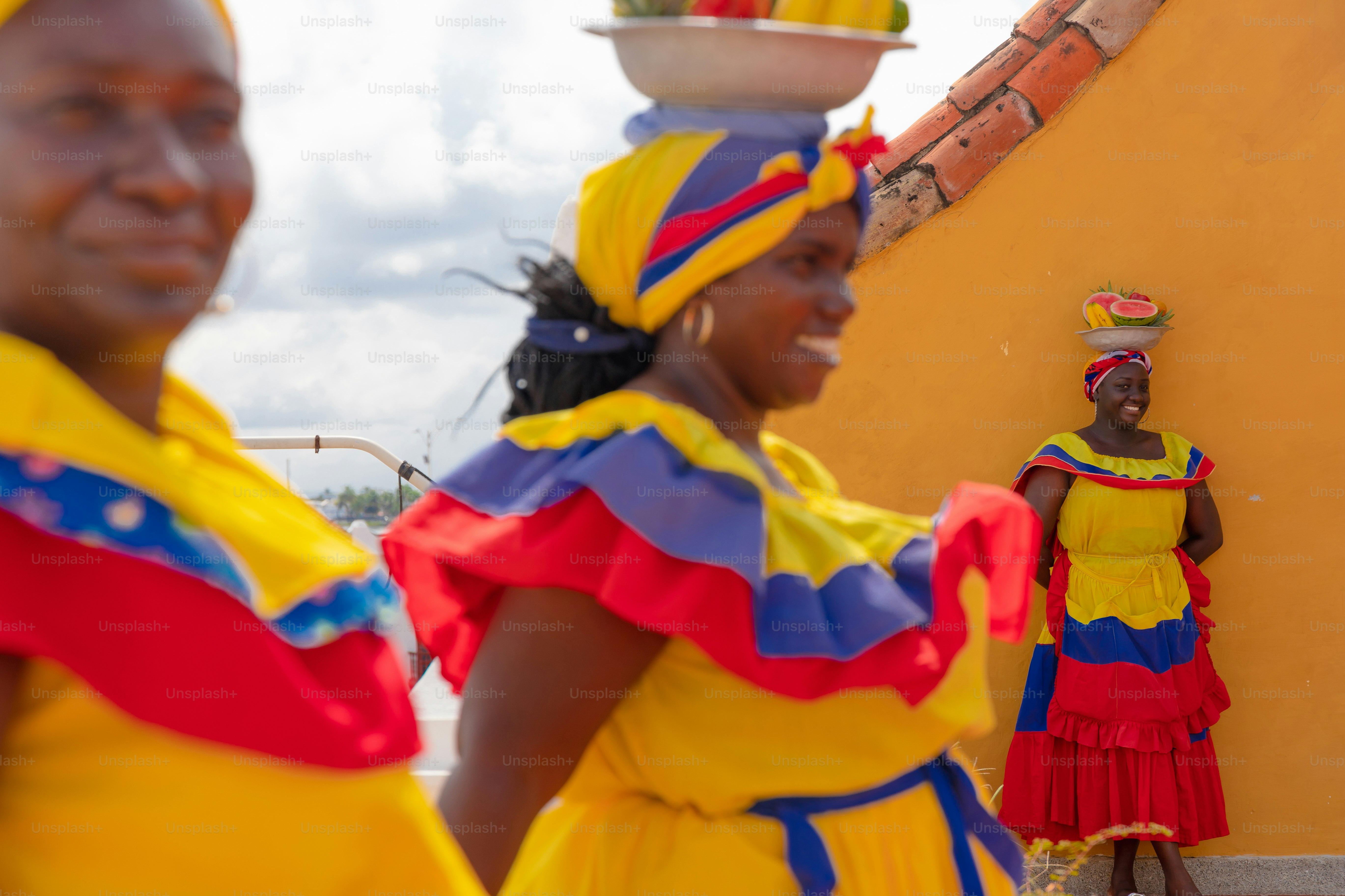 A group of people dressed in colorful clothing