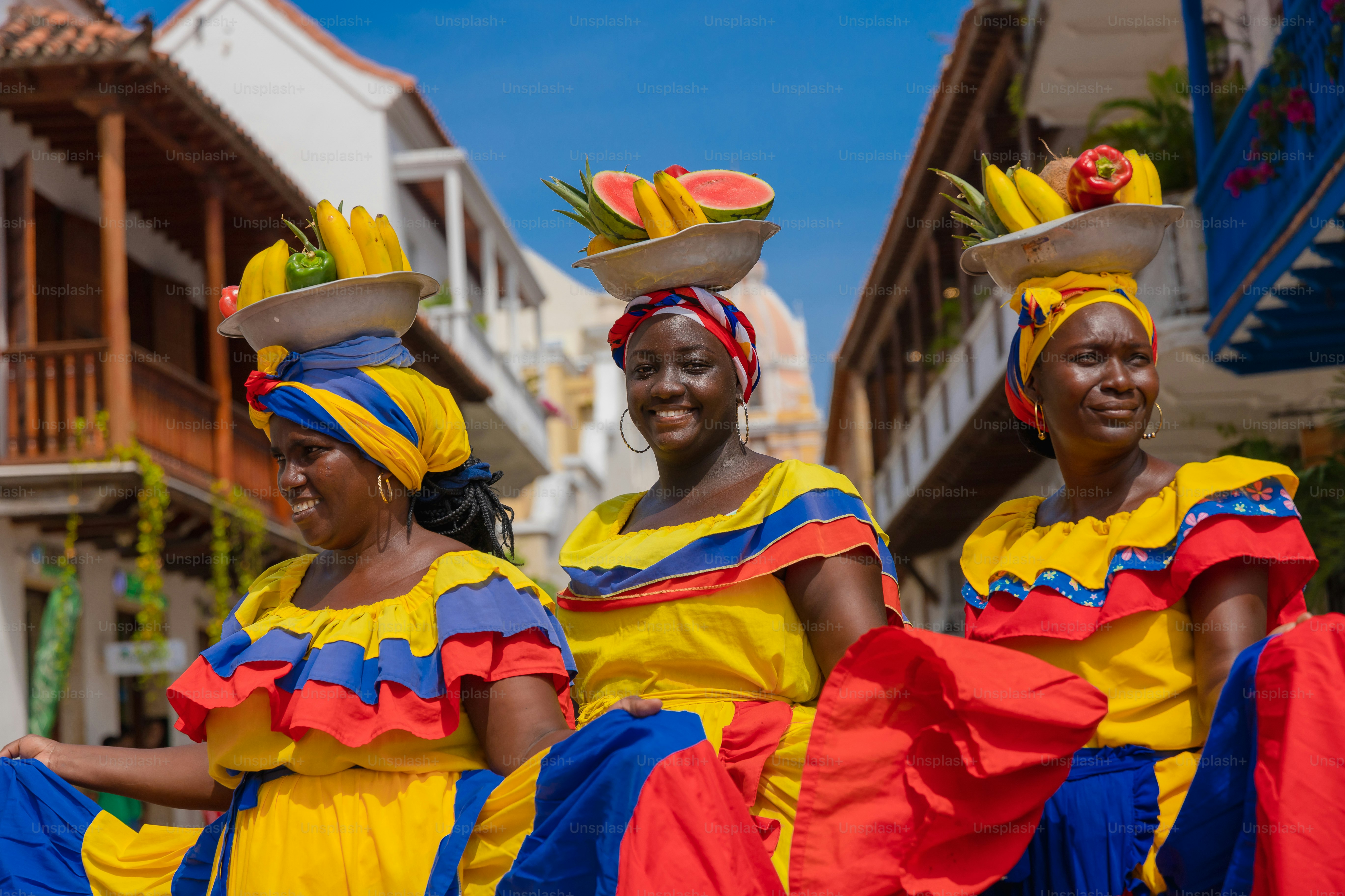A group of women in brightly colored outfits