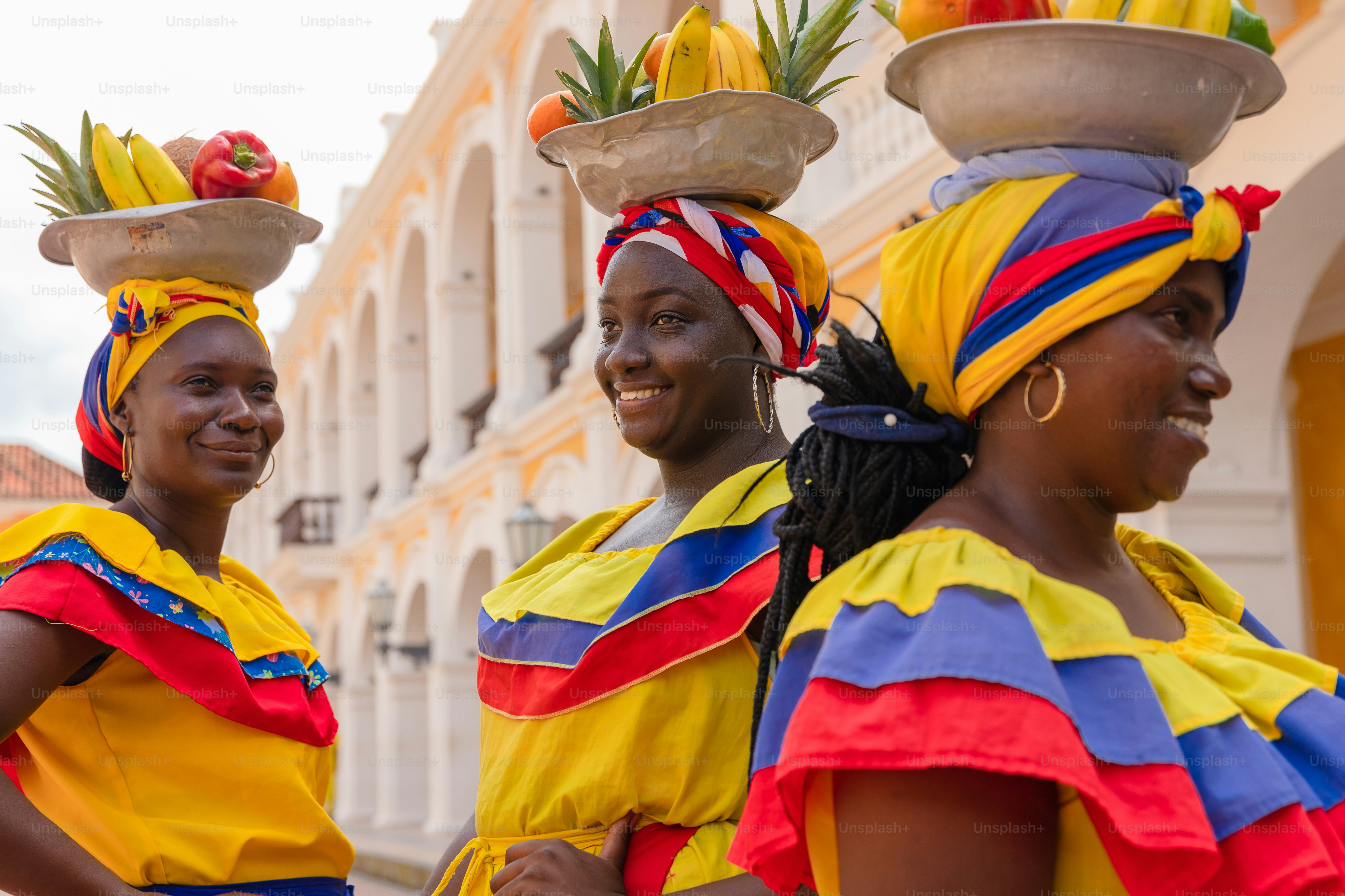 A group of women standing next to each other