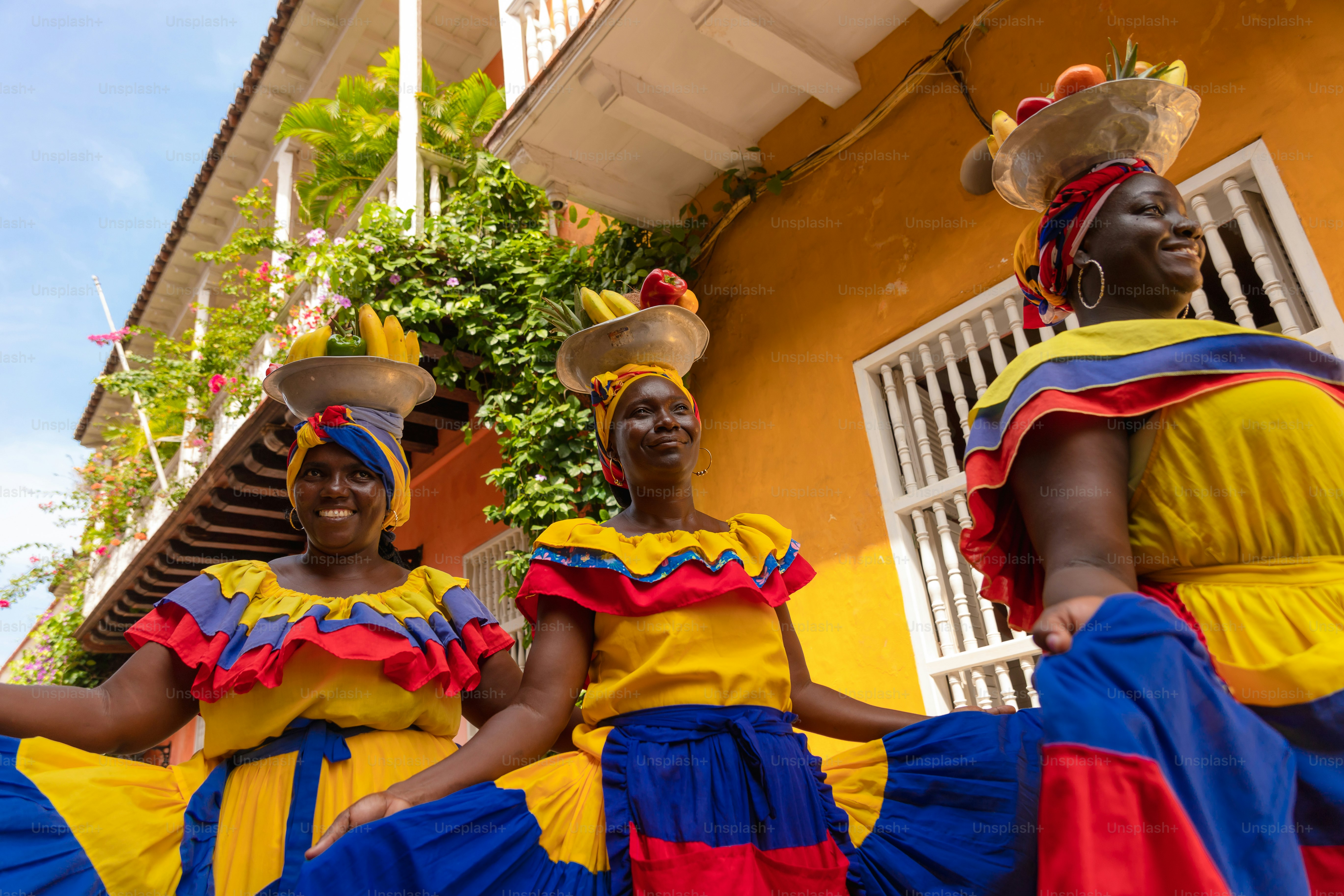 A group of women dressed in colorful clothing