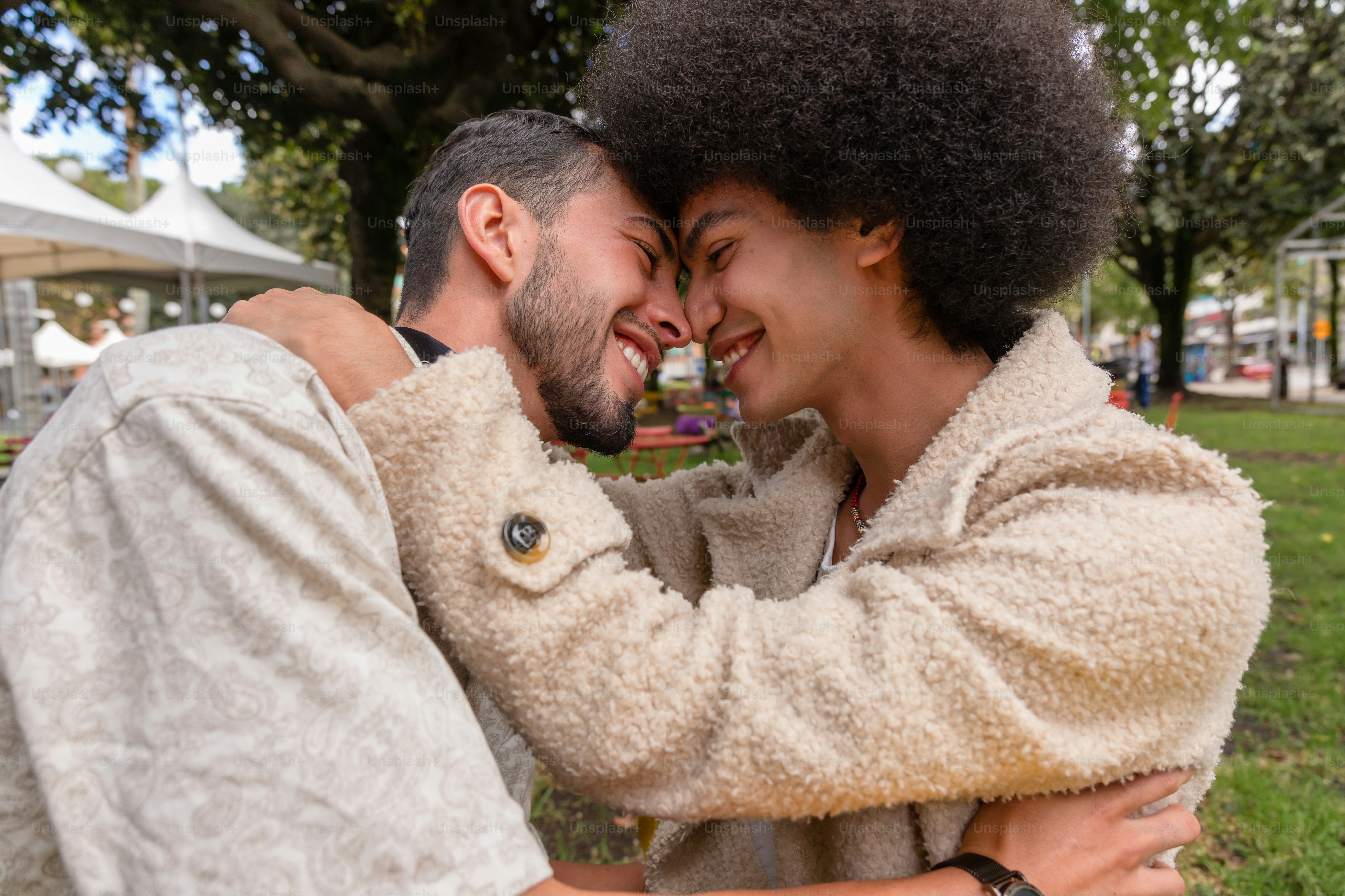 A couple of men standing next to each other