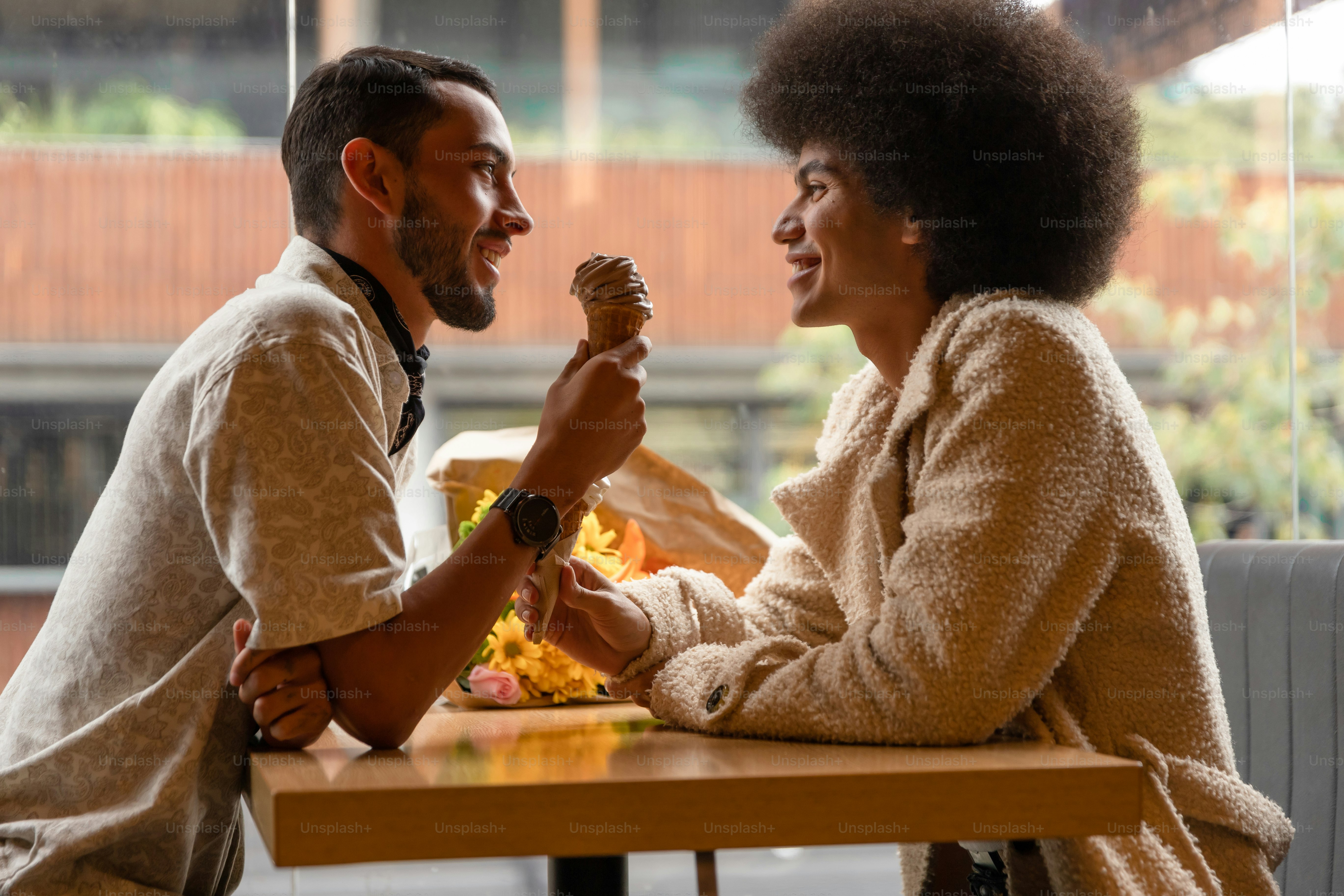 A man and a woman sitting at a table