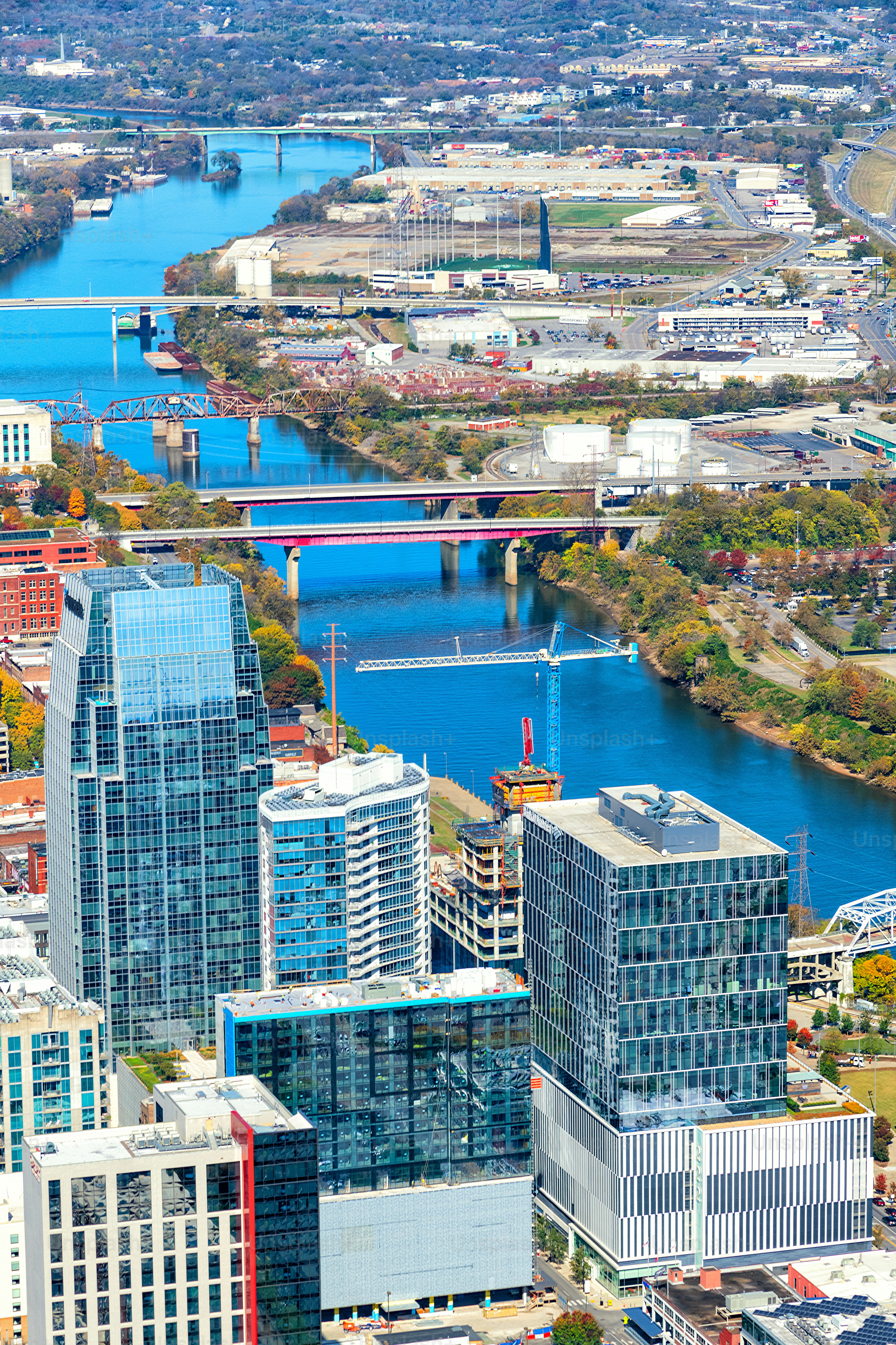 The Cumberland River beyond the skyline of Nashville shot from about 800 feet in altitude.