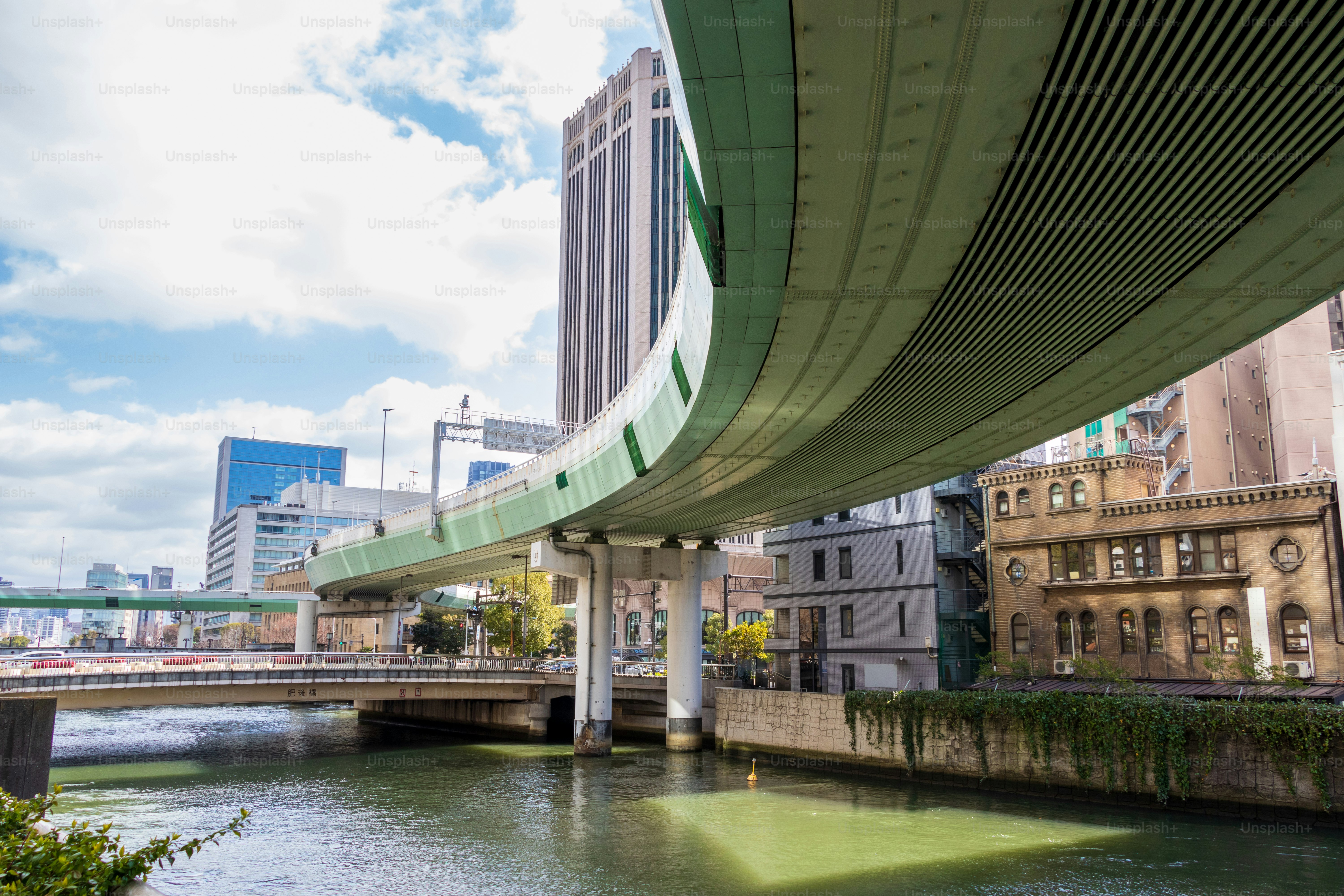 A highway that curves and crosses over a river
