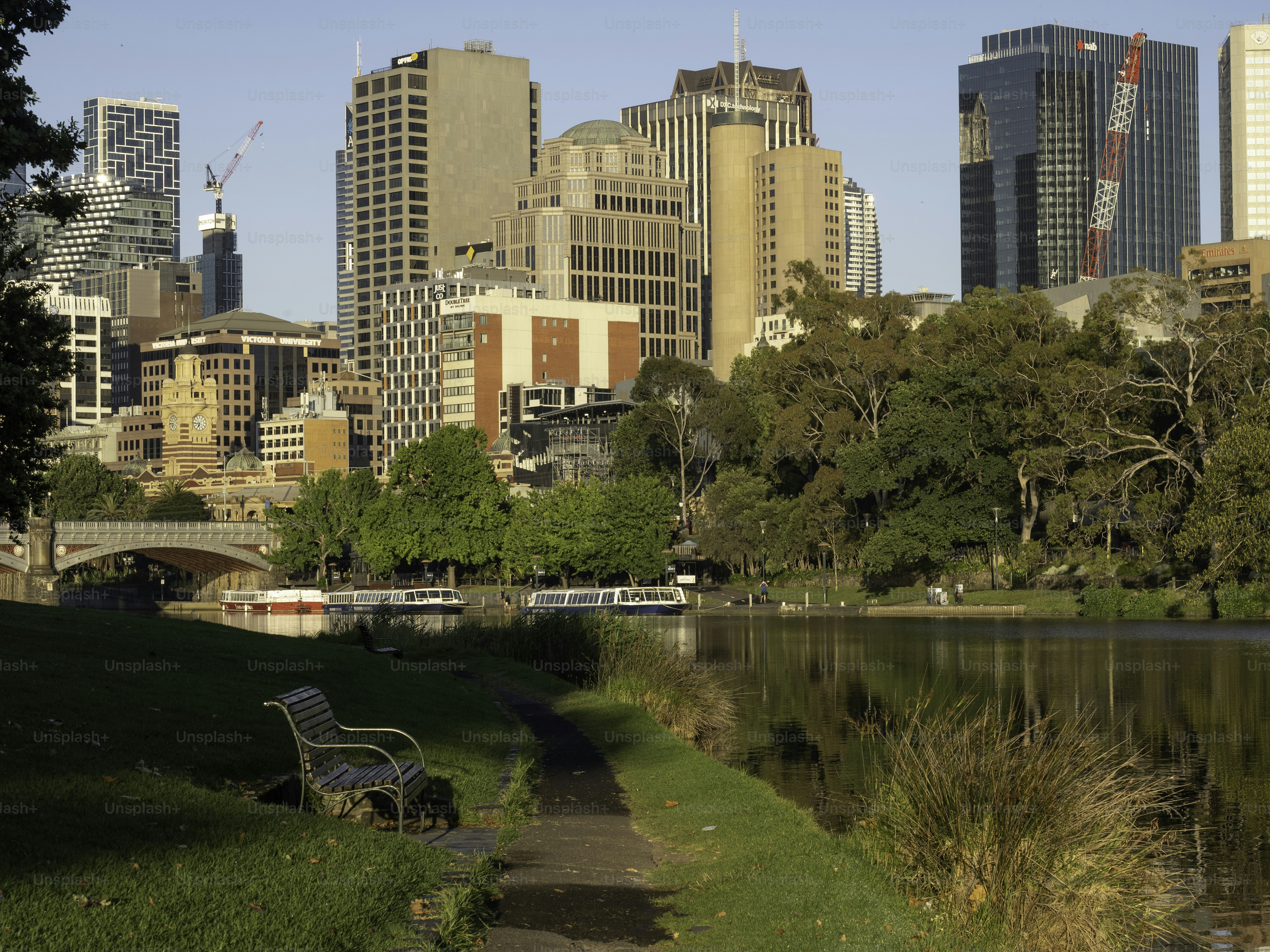 Melbourne skyline next to the Yarra River and Princes Bridge, St Kilda road