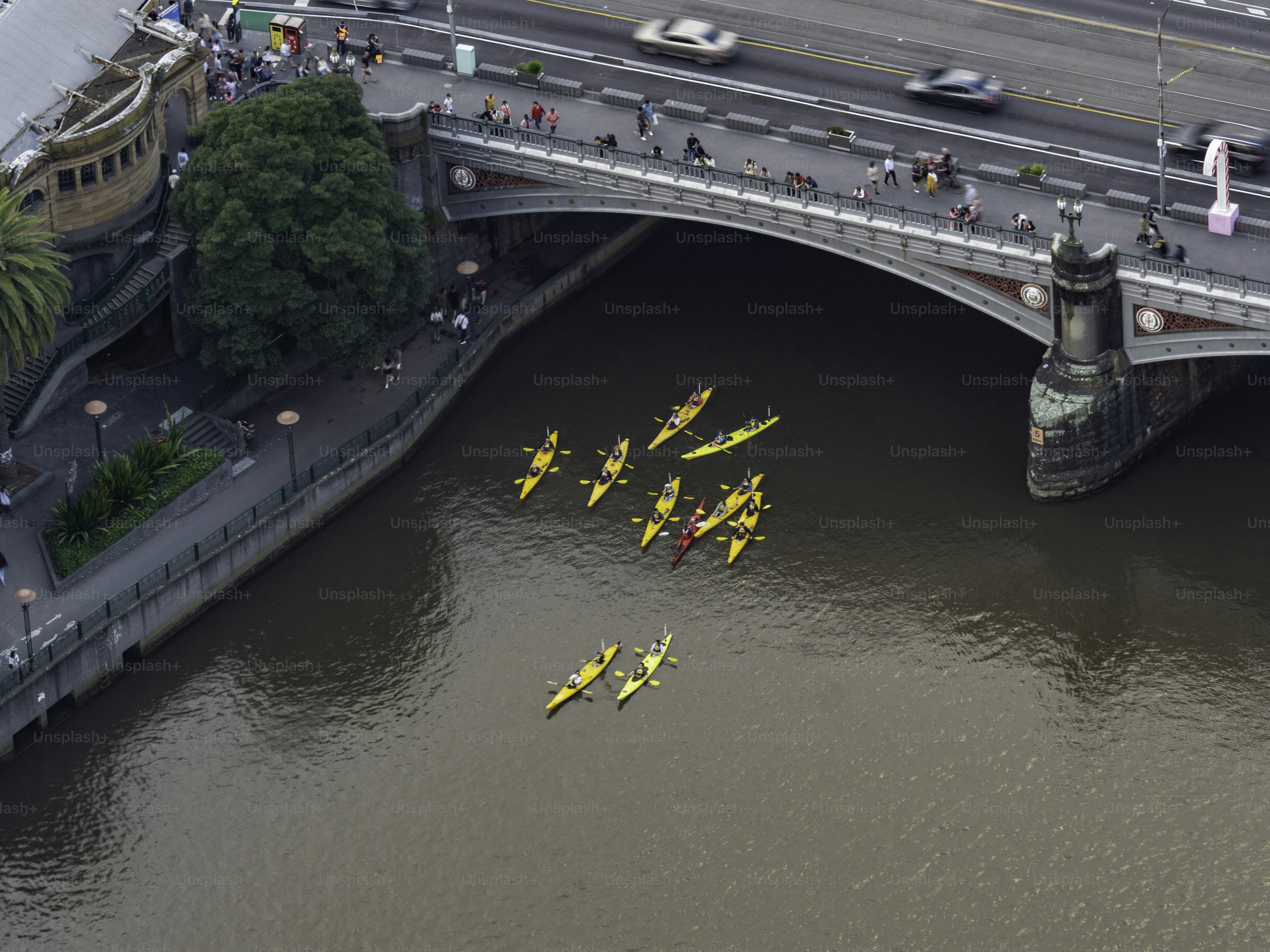 Tourist kayak tour floating down the Yarra River