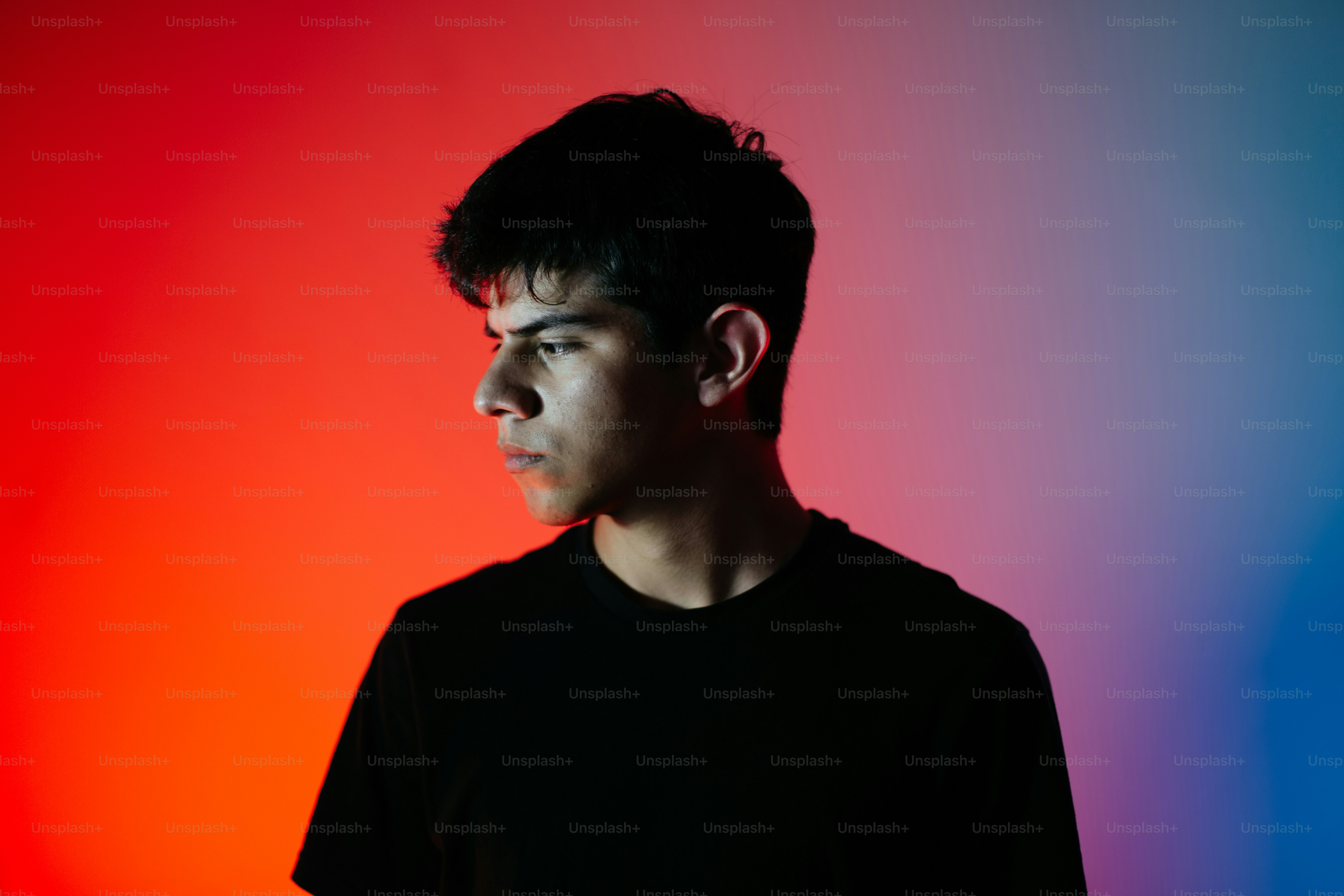 A man standing in front of a colorful background photo – Portrait Image ...