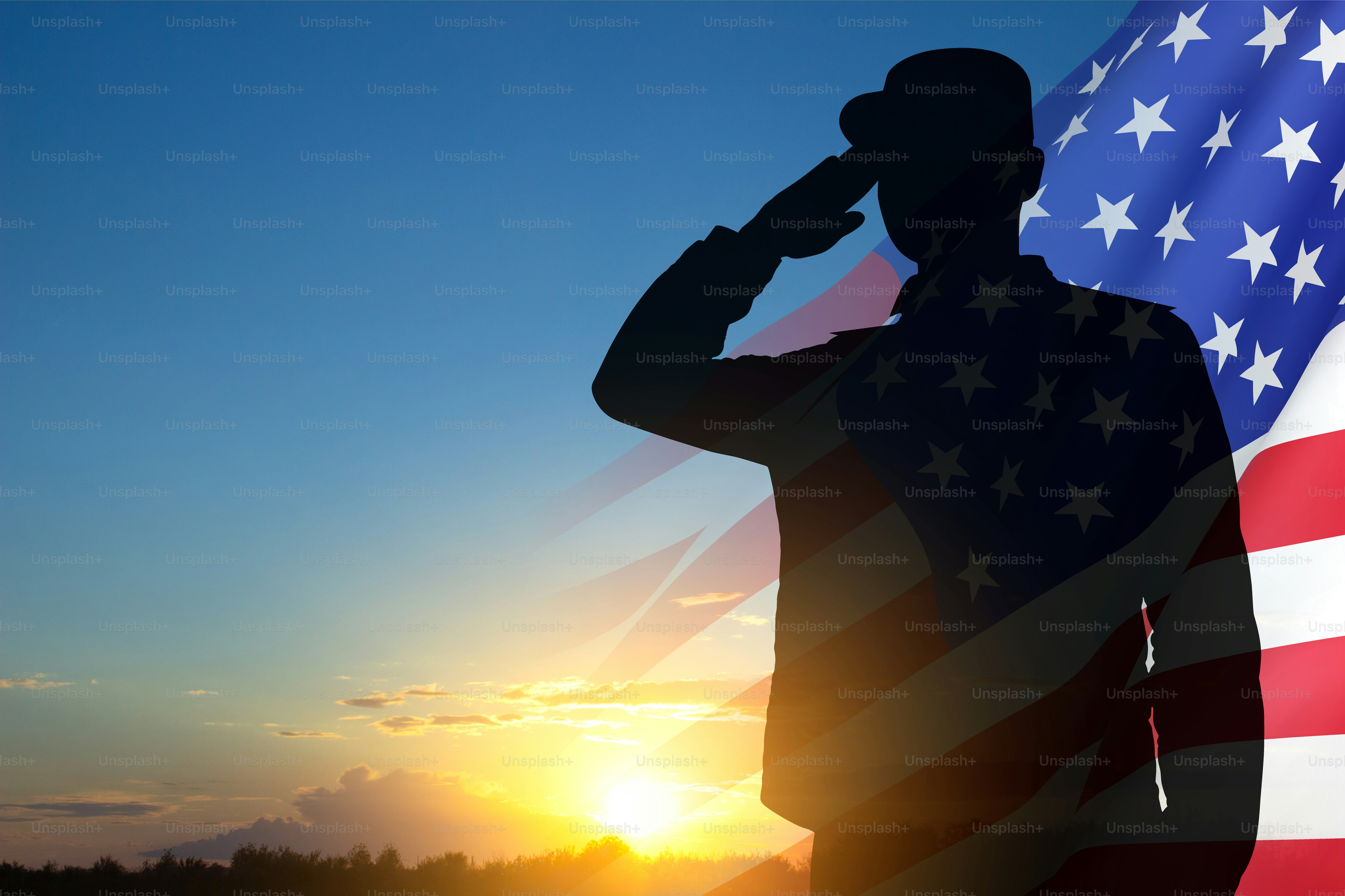 Silhouette of soldier with USA flag against the sunset. Greeting card for Veterans Day, Memorial Day, Independence Day