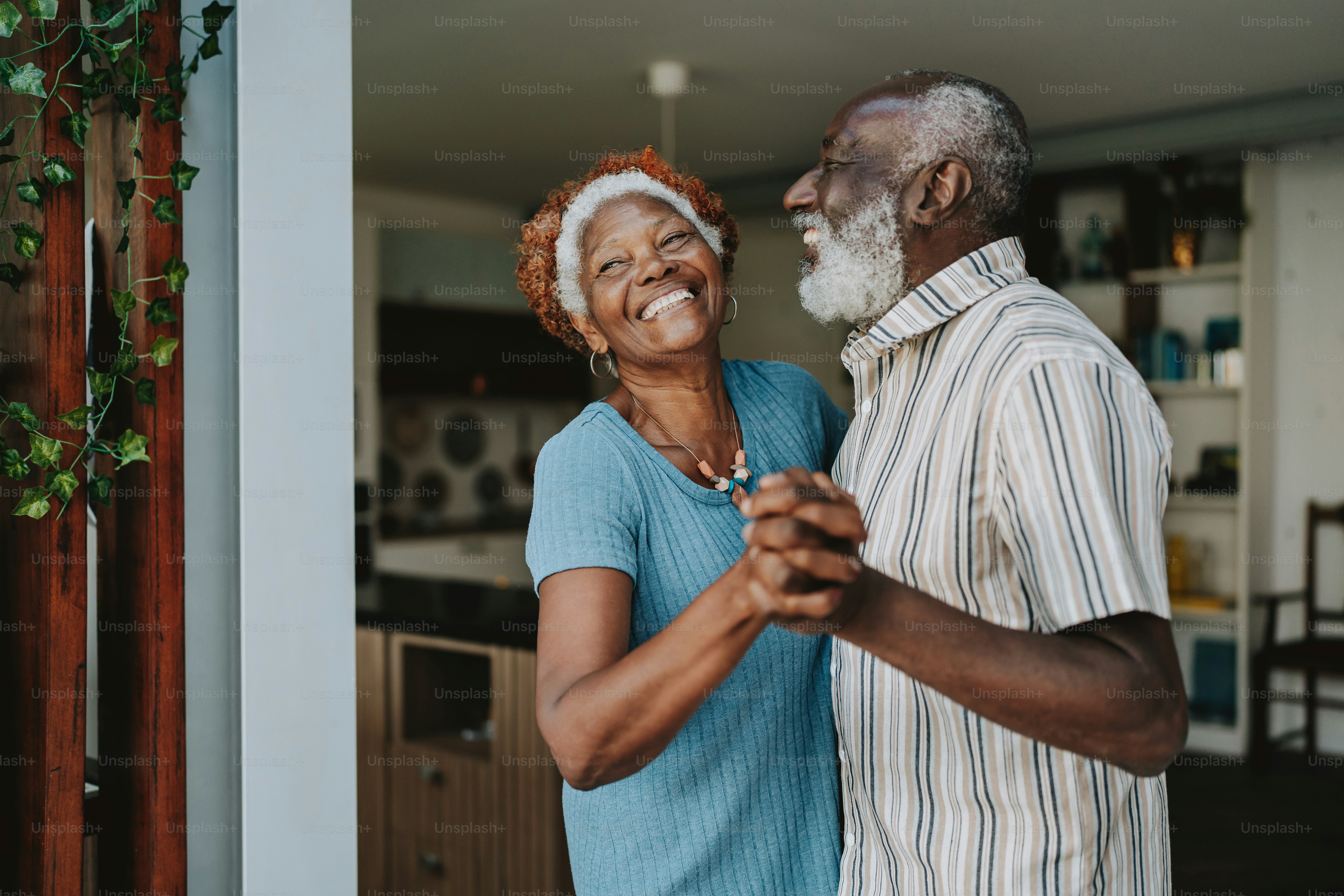 Portrait senior couple dancing together