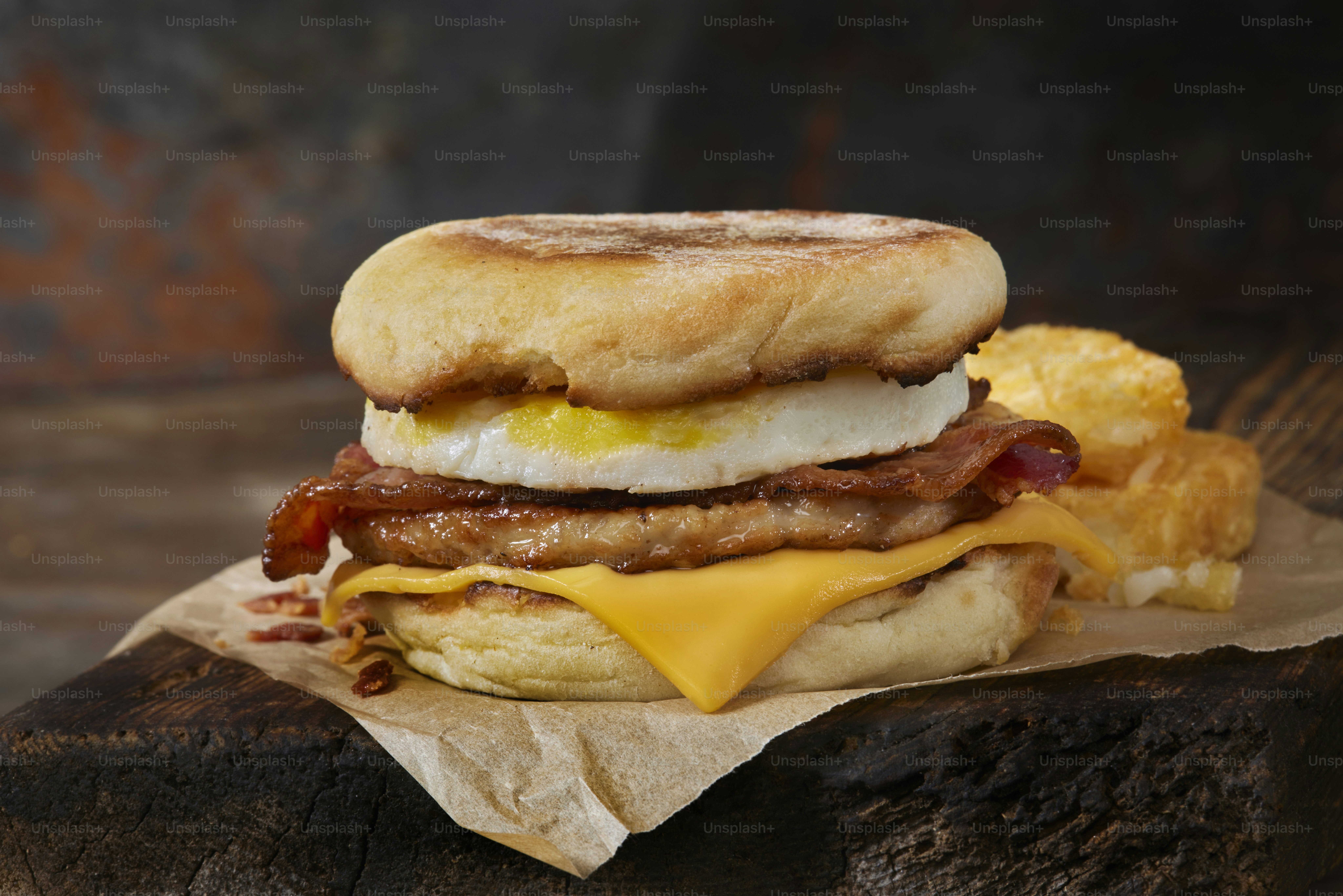 The Copycat "Mighty Muffin" Breakfast Sandwich with an Egg, Double Bacon, Sausage Patty, Cheese and a Hash Brown Patty