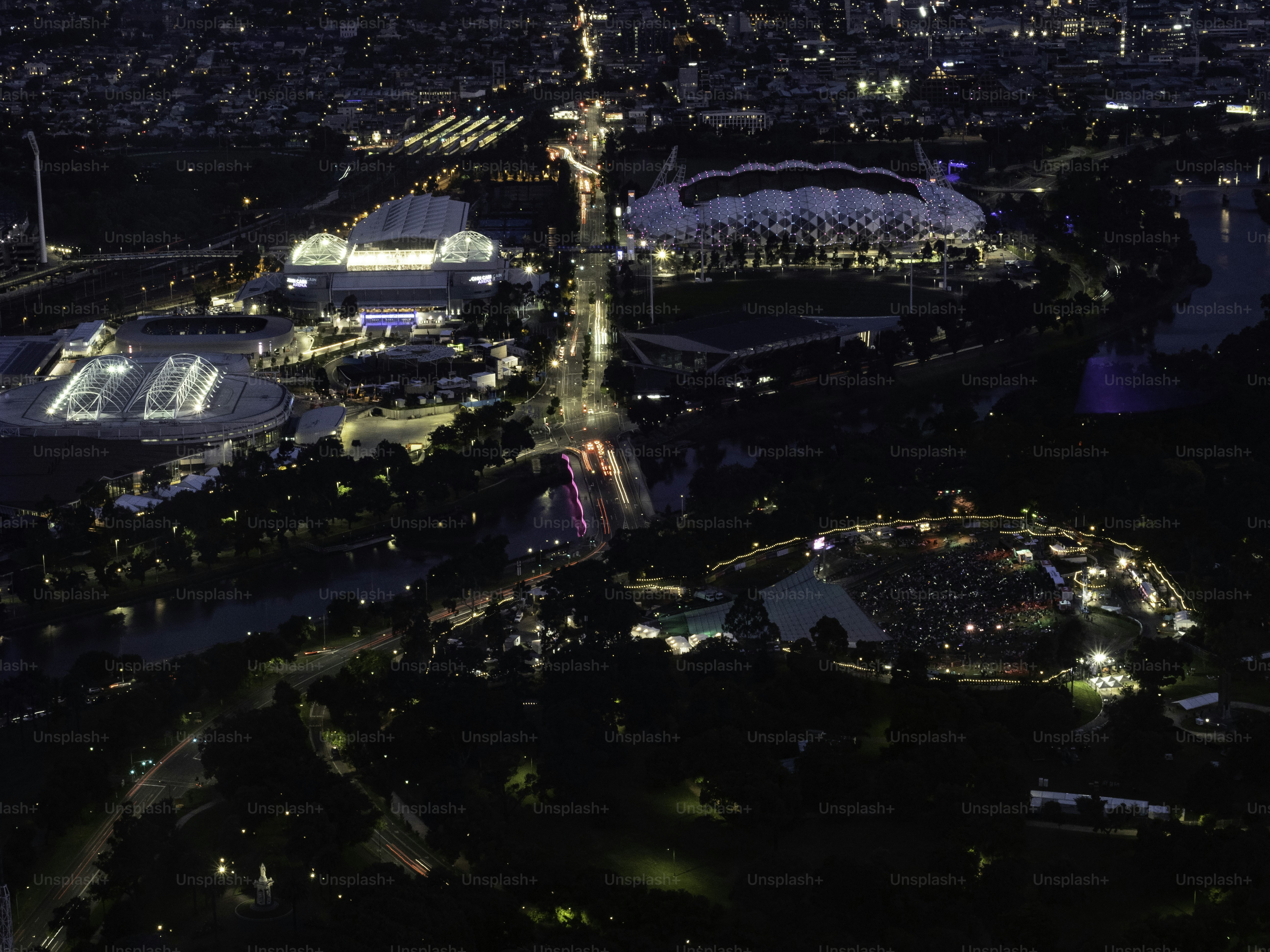 High angle view of Melbourne Park Precinct at night and Yarra River