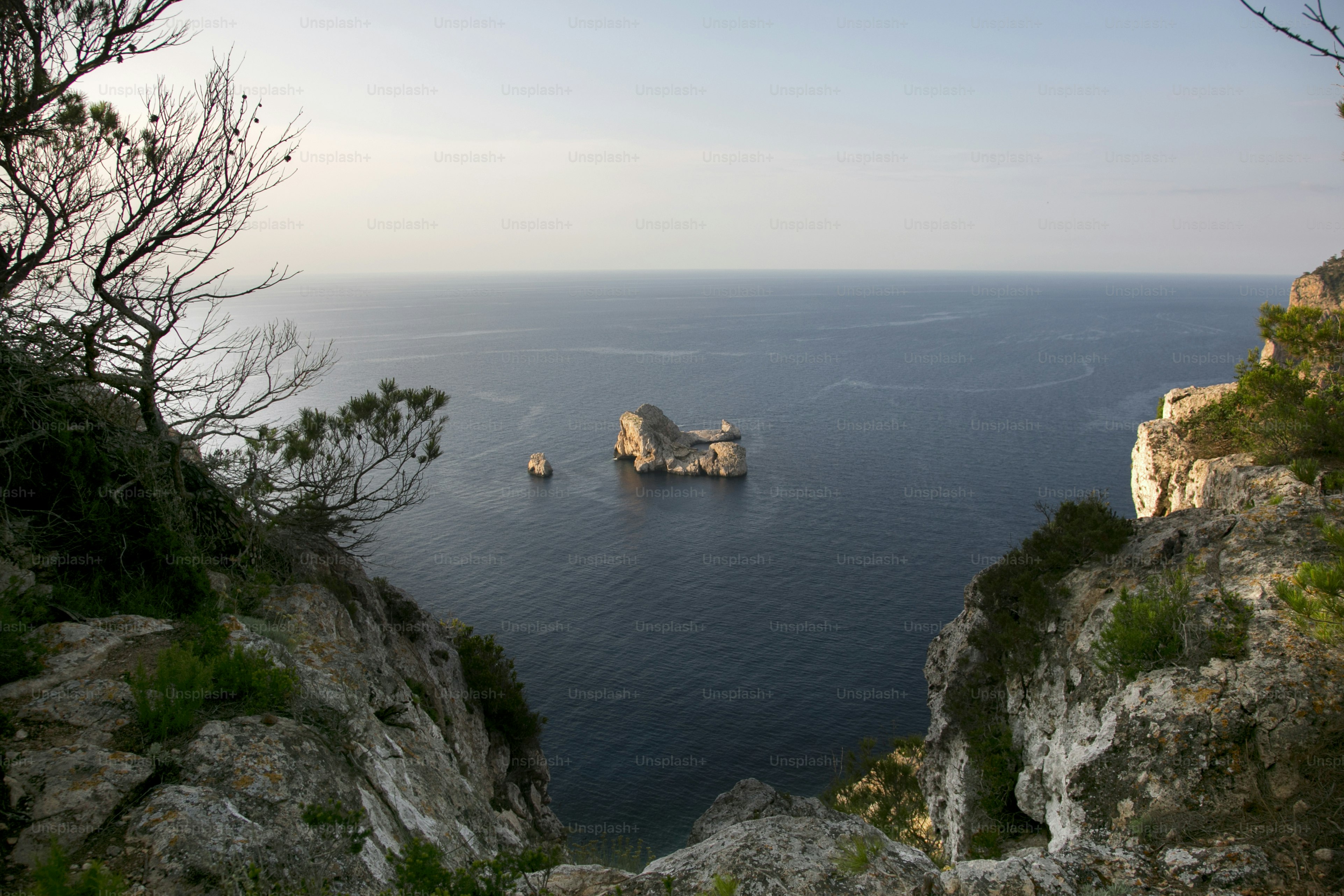 Views of the sea and Ses Margalides of ​​Ibiza from the cliffs in the north of the island in Santa Agnes de Corona.