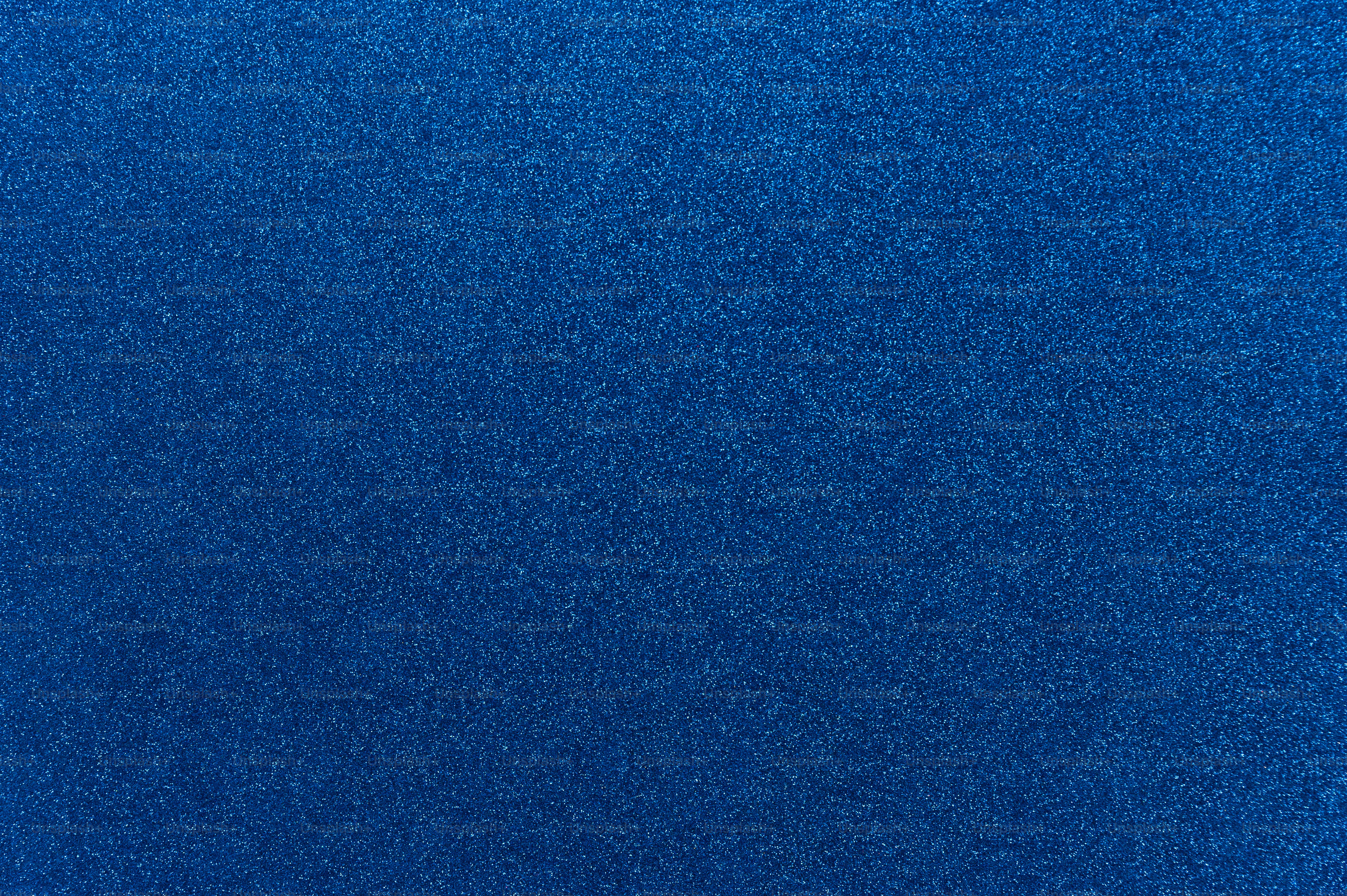 Blue colored glitter cardstock paper background