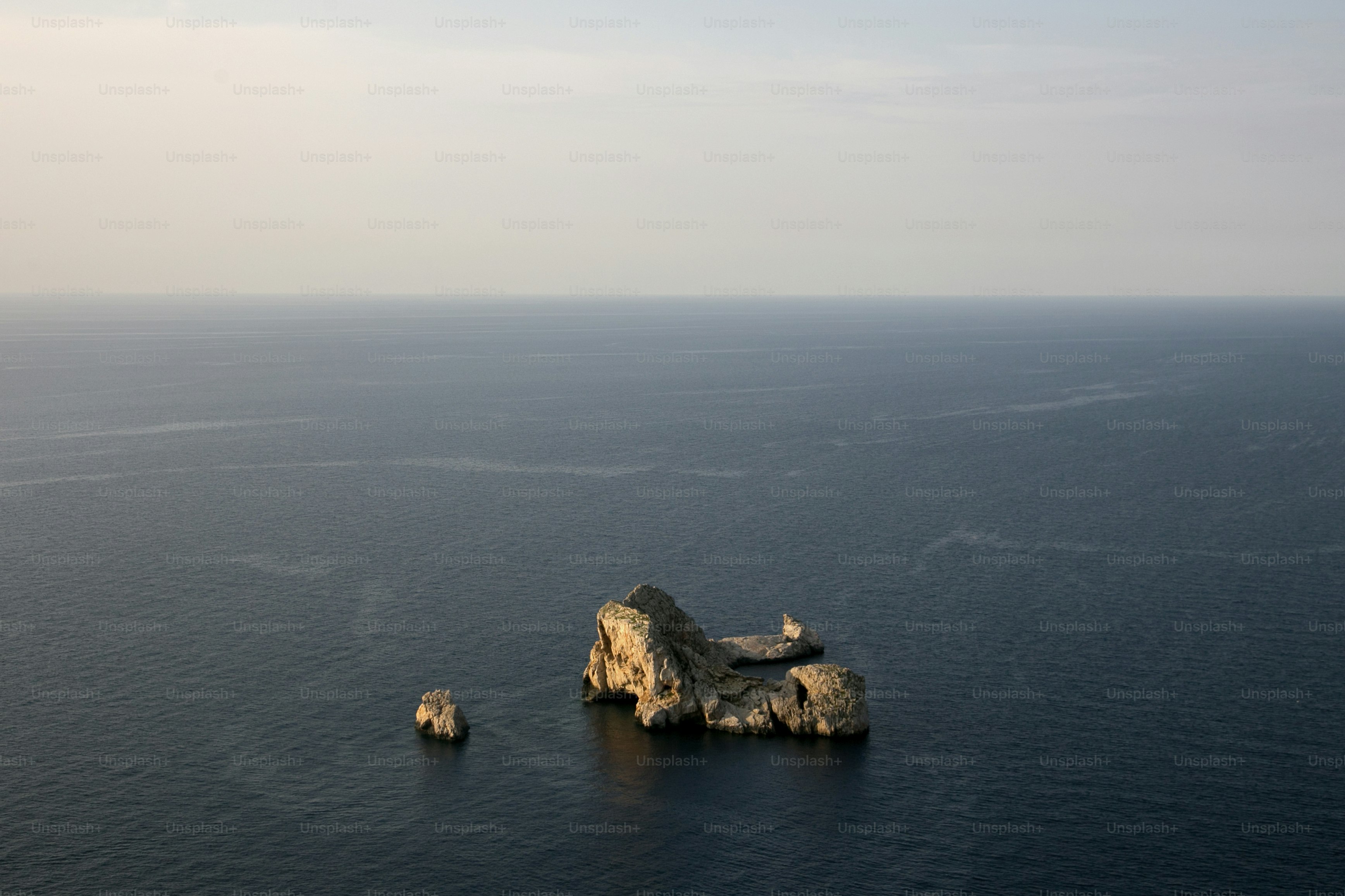 Views of the sea and Ses Margalides of ​​Ibiza from the cliffs in the north of the island in Santa Agnes de Corona.
