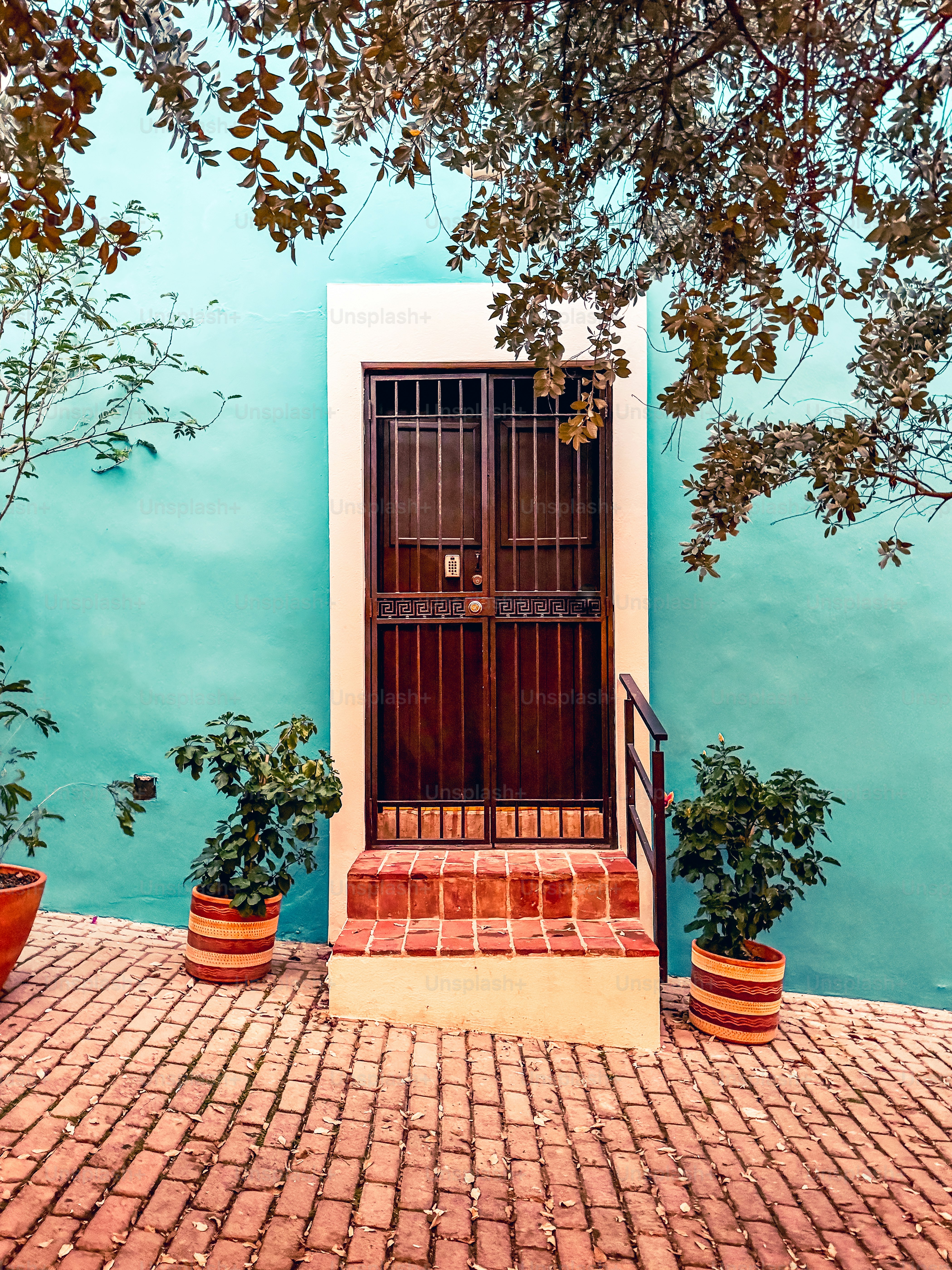 San Juan, Puerto Rico - March 26, 2024: Rustic building entrances and doors along the side streets in the old town of San Juan, Puerto Rico