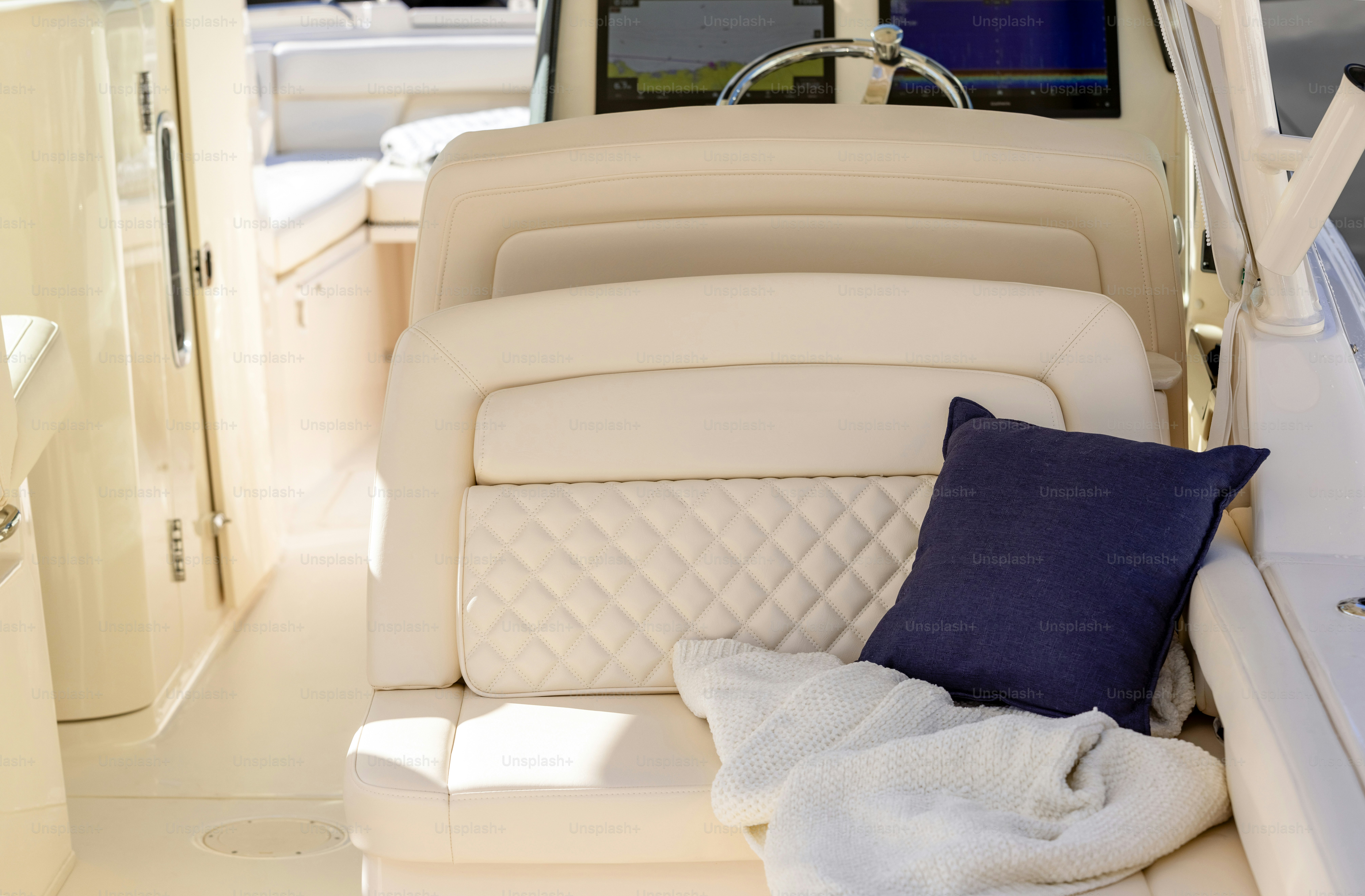 Inside of luxury modern motorboat with leather comfortable seat, background with copy space, full frame horizontal composition