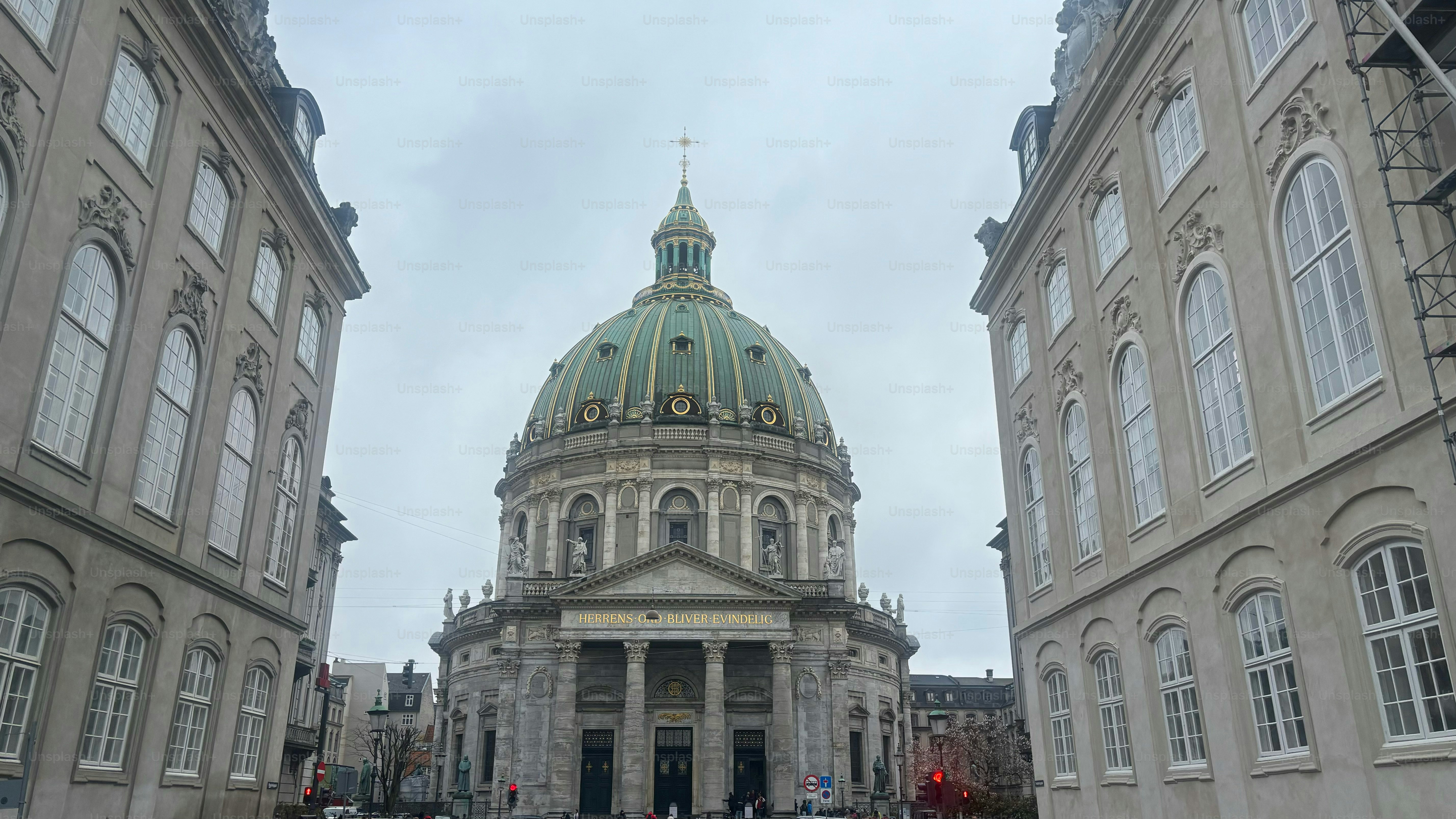 View of a historical church between two buildings