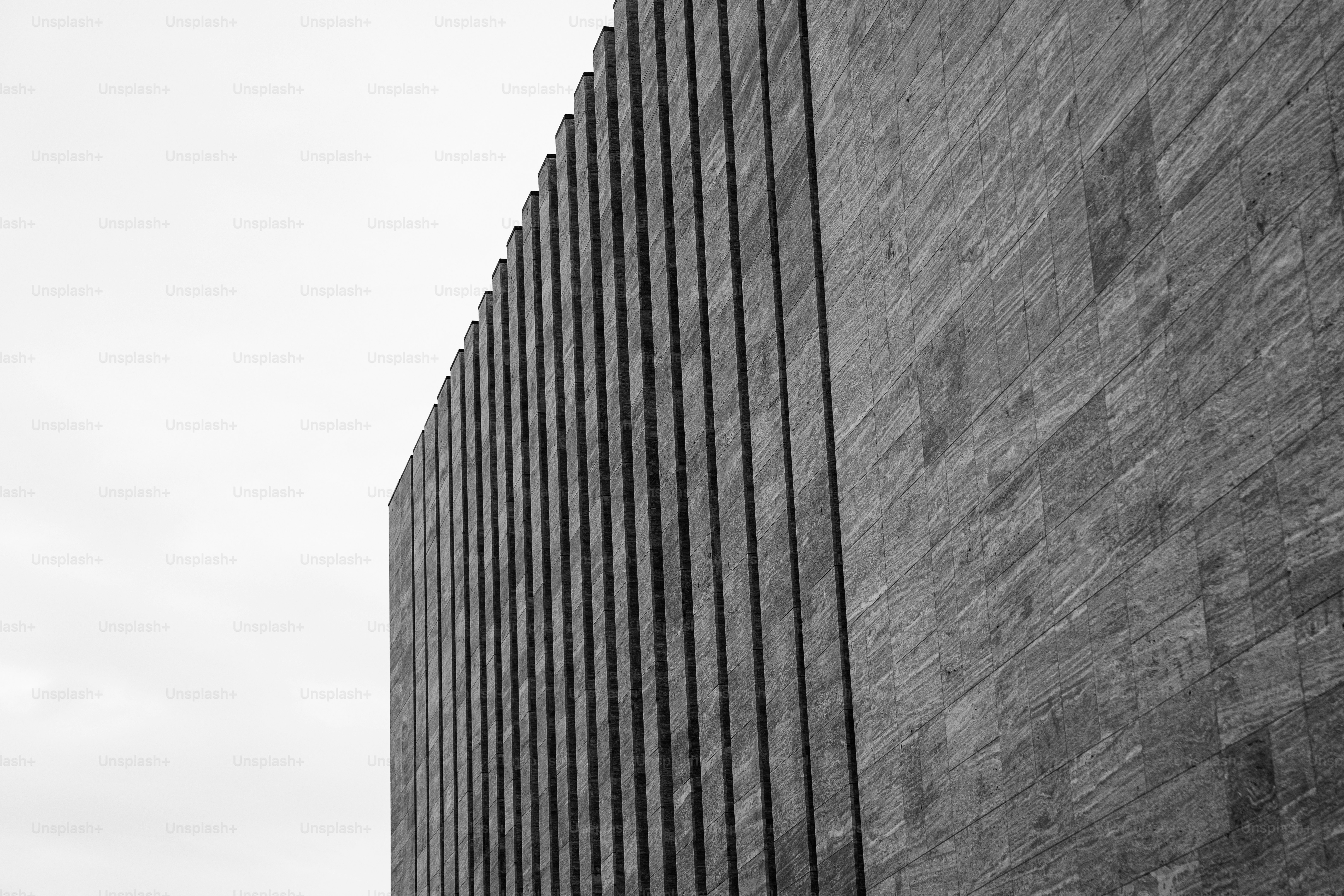 A black and white photo of a tall building