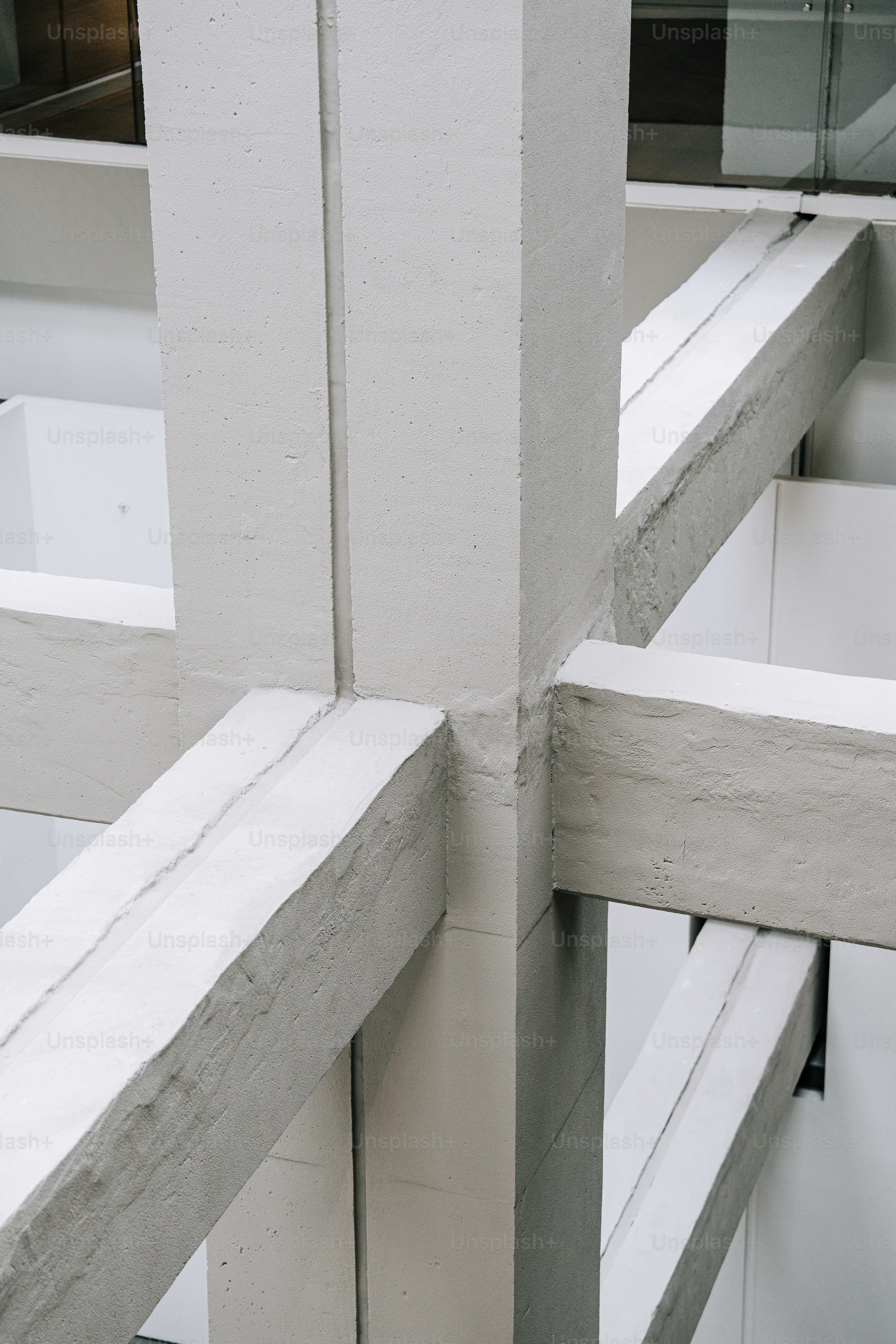 A close up of a white wooden railing