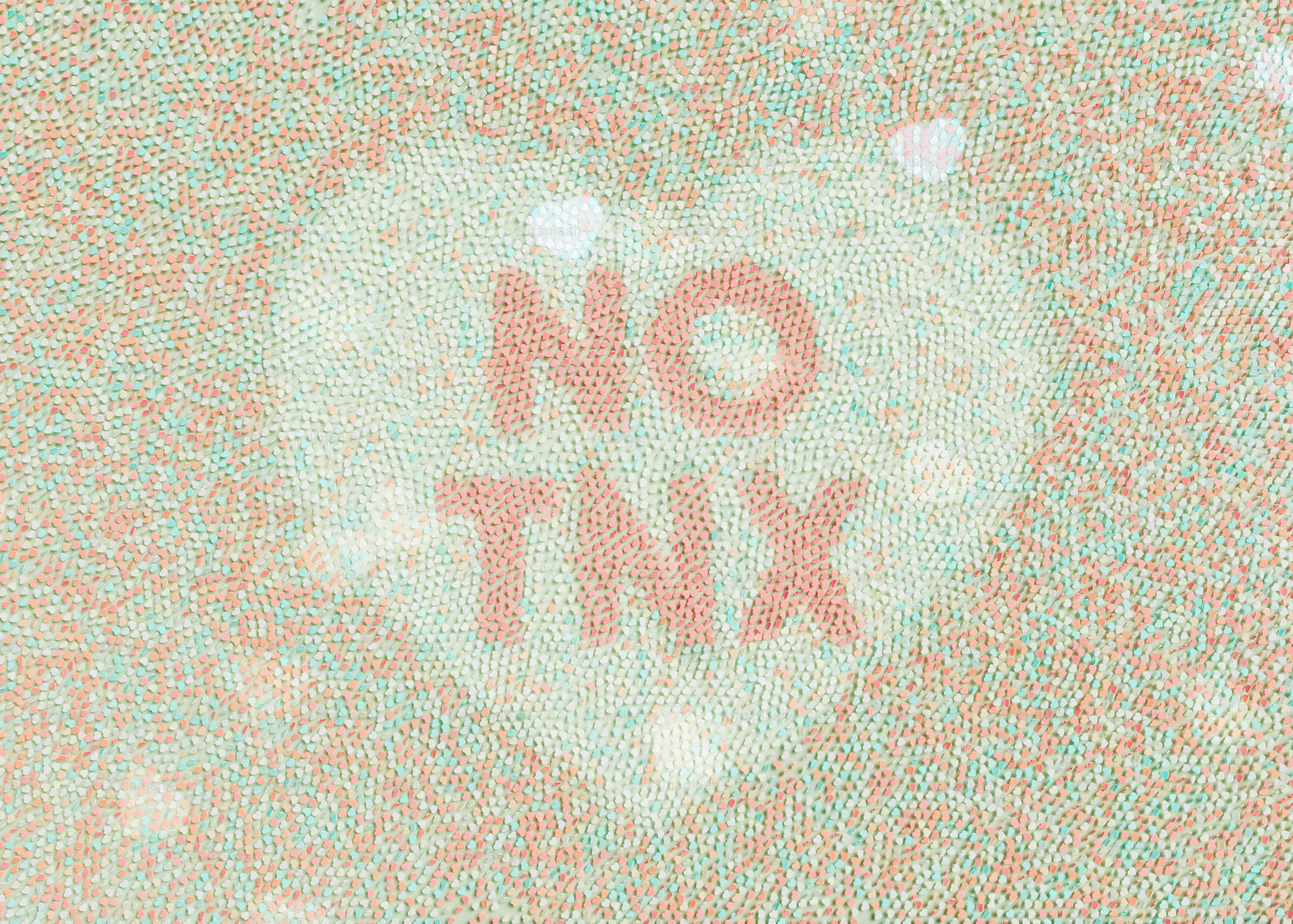 A picture of a heart with the words no knit written on it