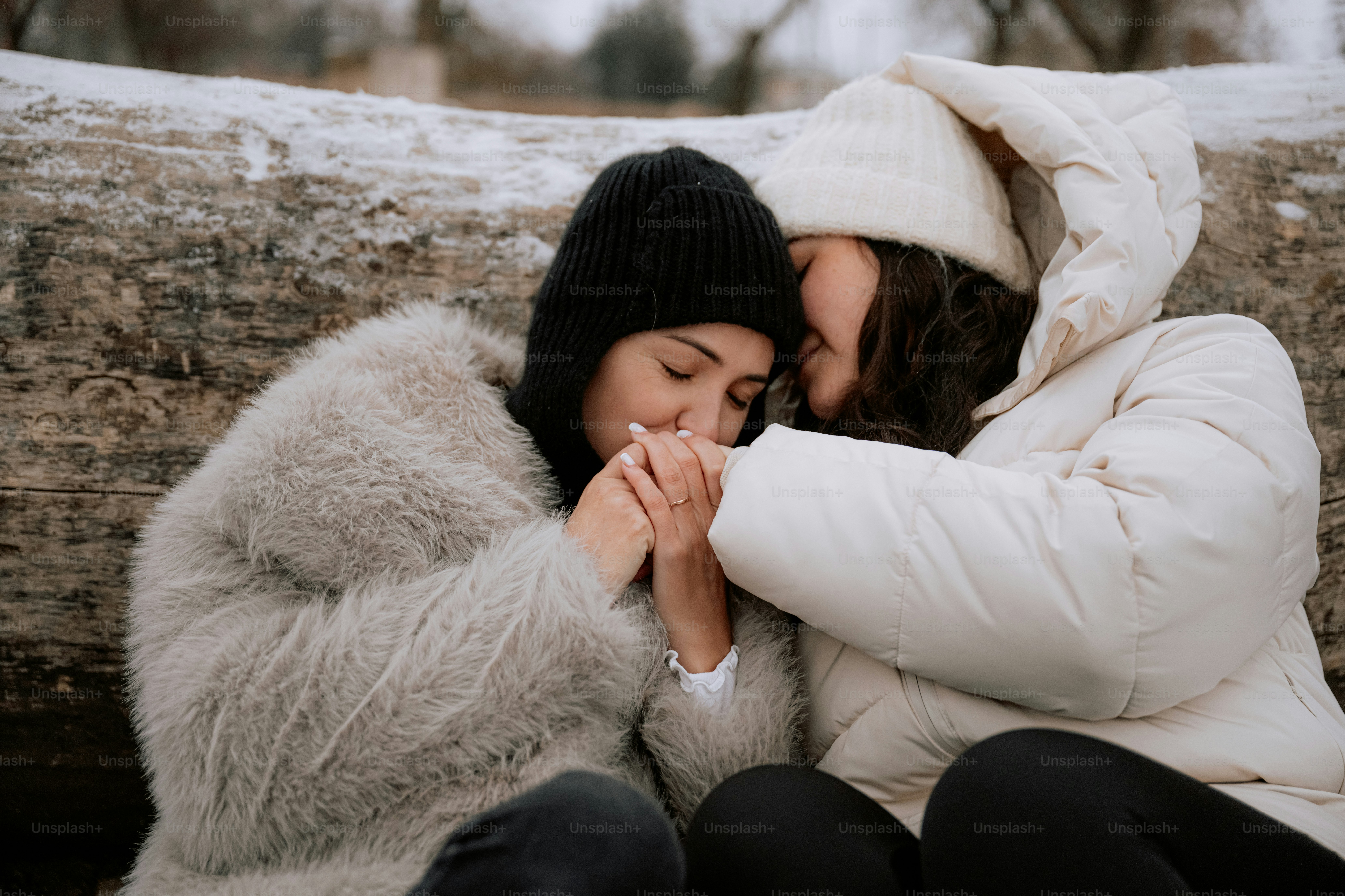 A couple of people that are kissing each other