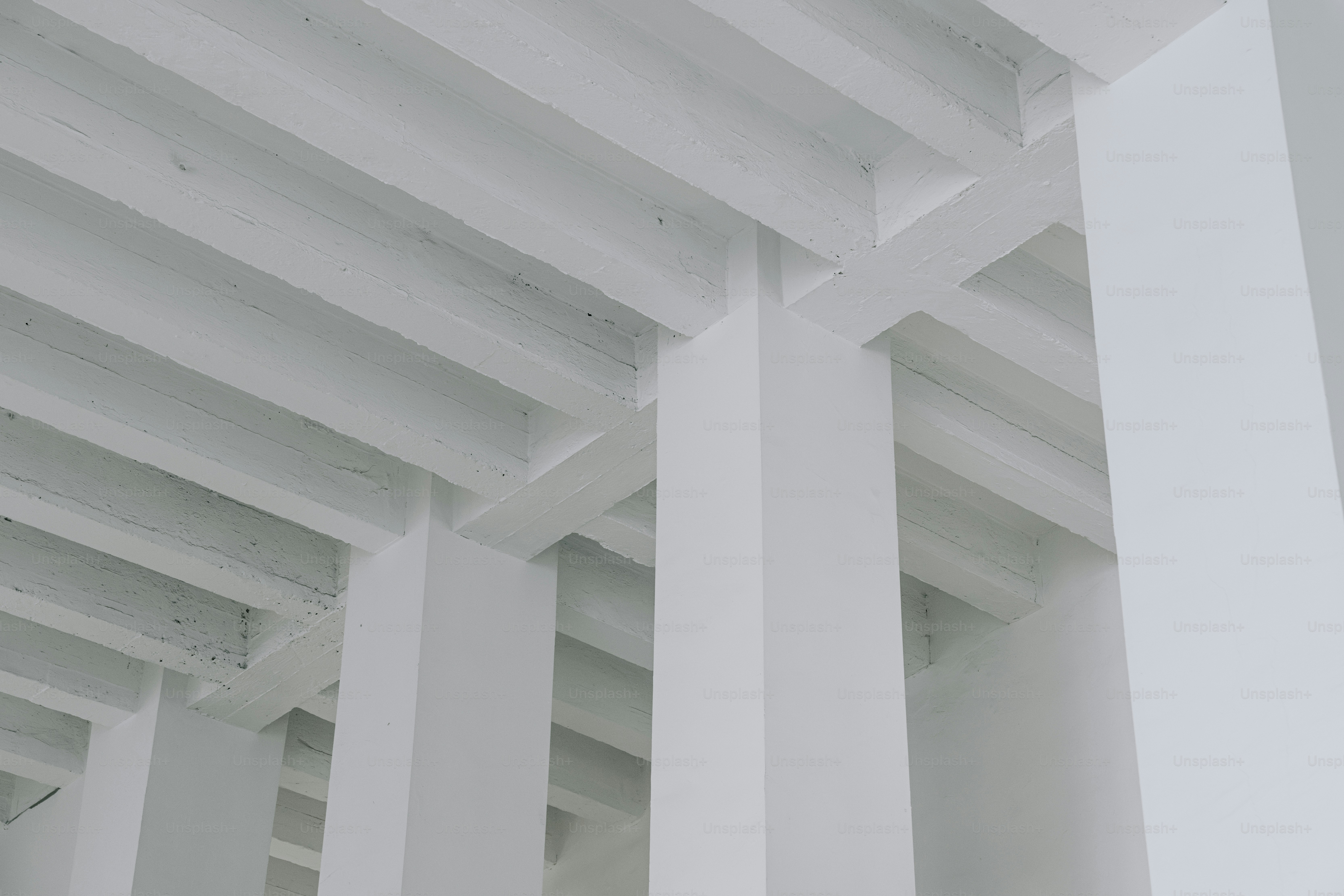 A close up of a white building with columns