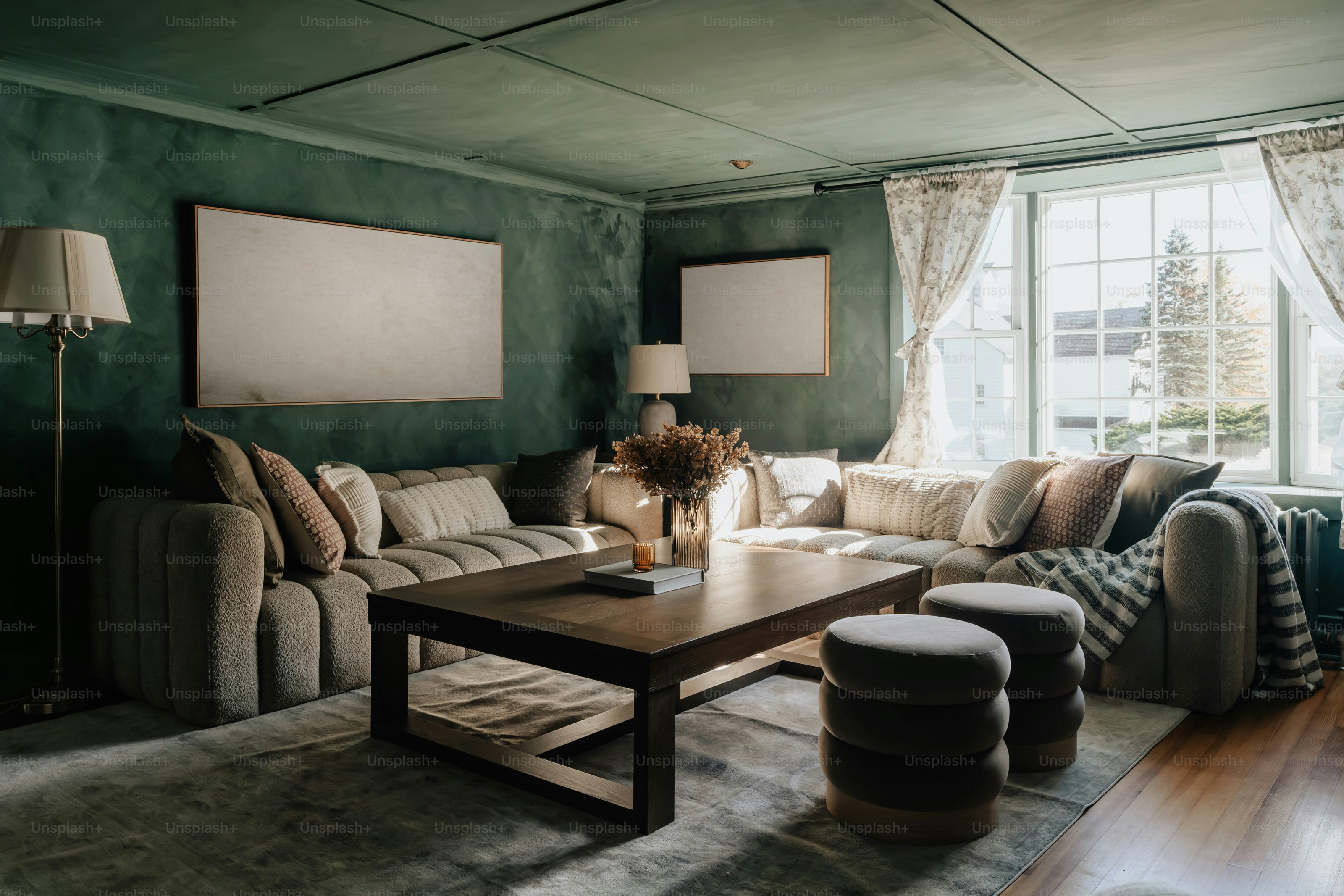 A living room filled with furniture and a large window