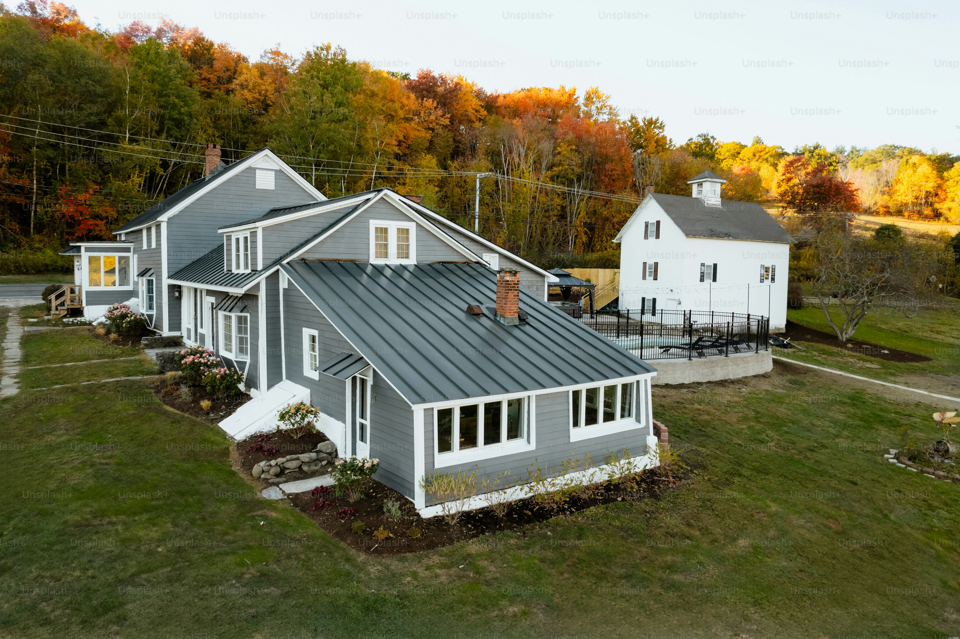 An aerial view of a house in the fall