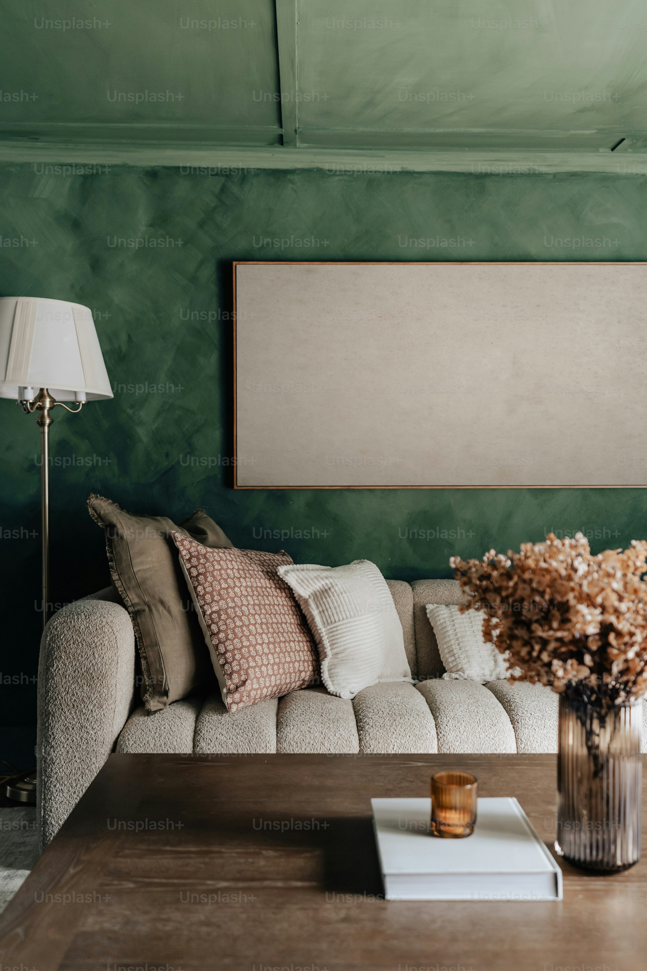 A living room with a couch and a table